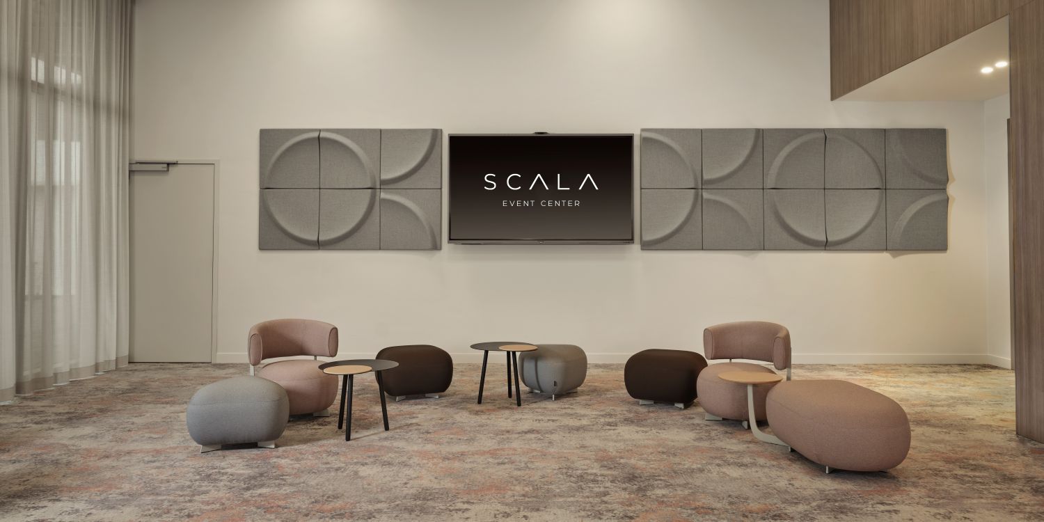 cosy meeting social seating area with pink chairs
