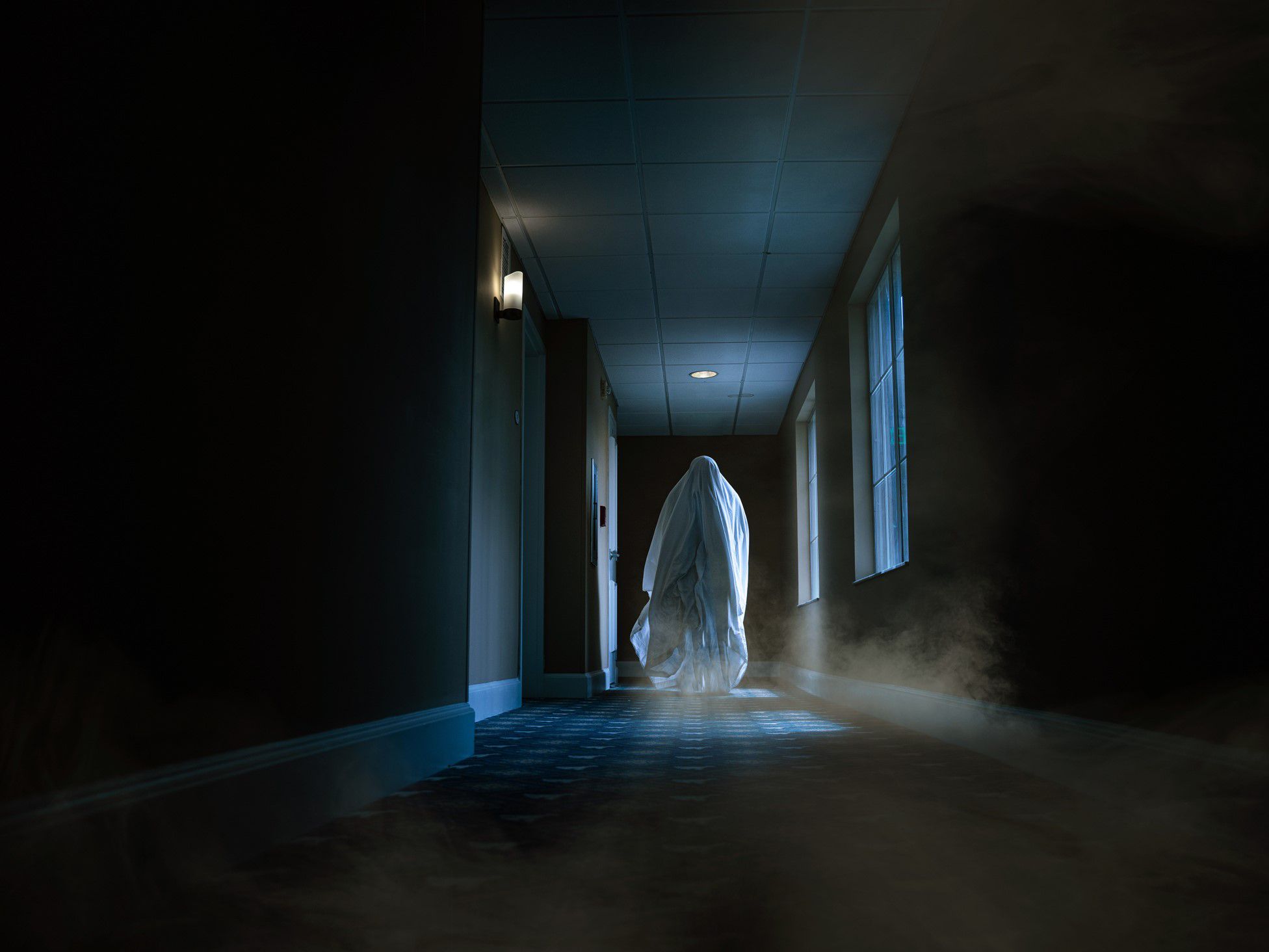 Ghost floating down a hallway