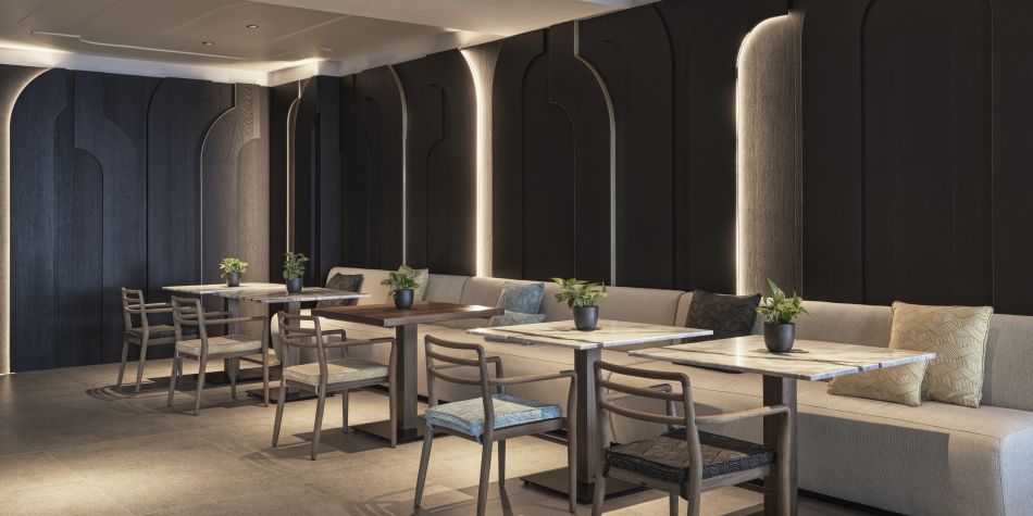 Indoor dining with at the stylish Knossos Restaurant with white booths