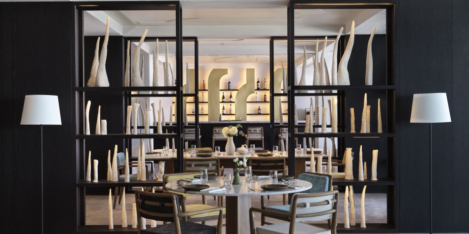 Indoor dining area with plenty seating and stylish ineteriors