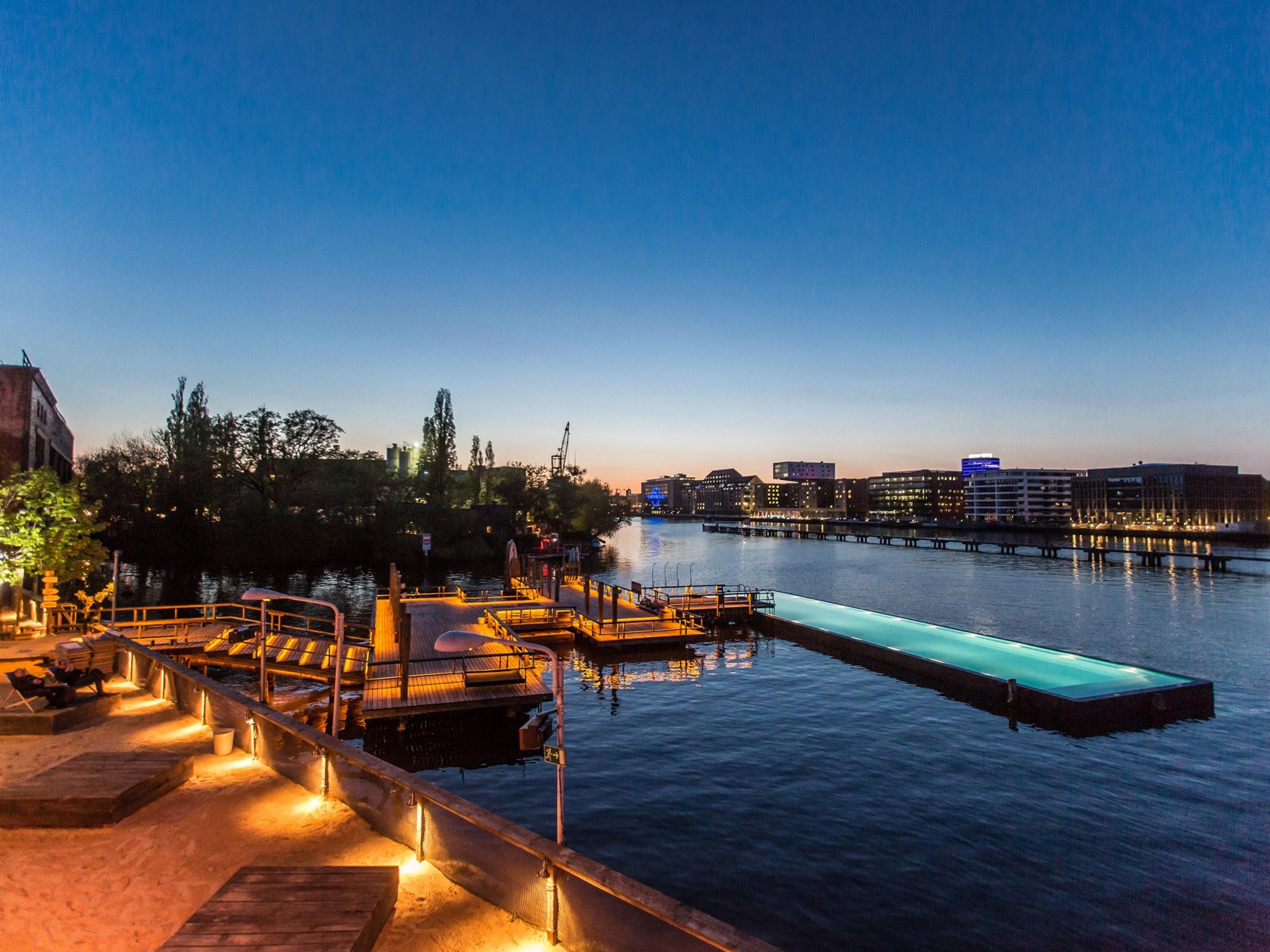 Float in the iconic Badeschiff—a cool pool built inside a repurposed barge on the Spree. Open daily 8 am–midnight, enjoy DJ beats, riverside bar vibes, and unbeatable skyline views. The ultimate urban swim experience this summer!