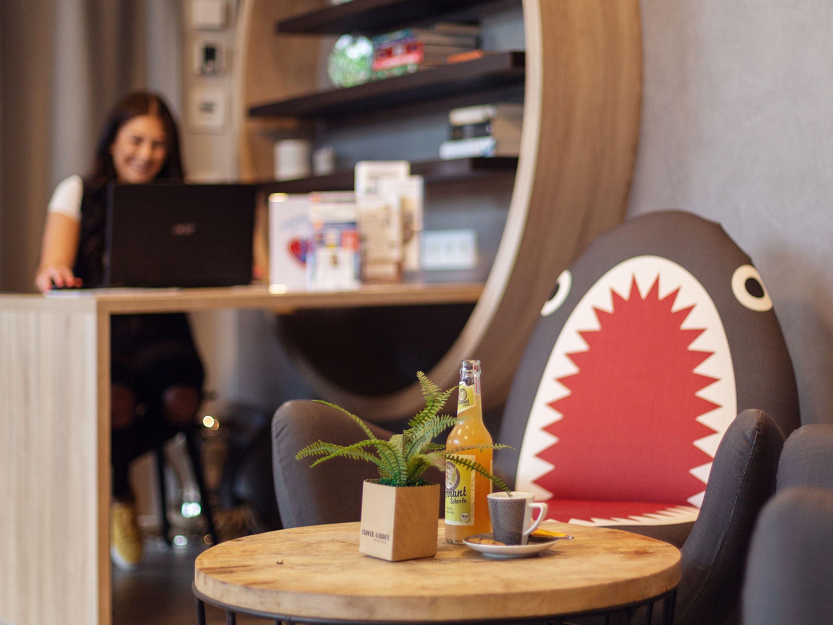 A stylish lobby that combines comfort, culture, and creativity.