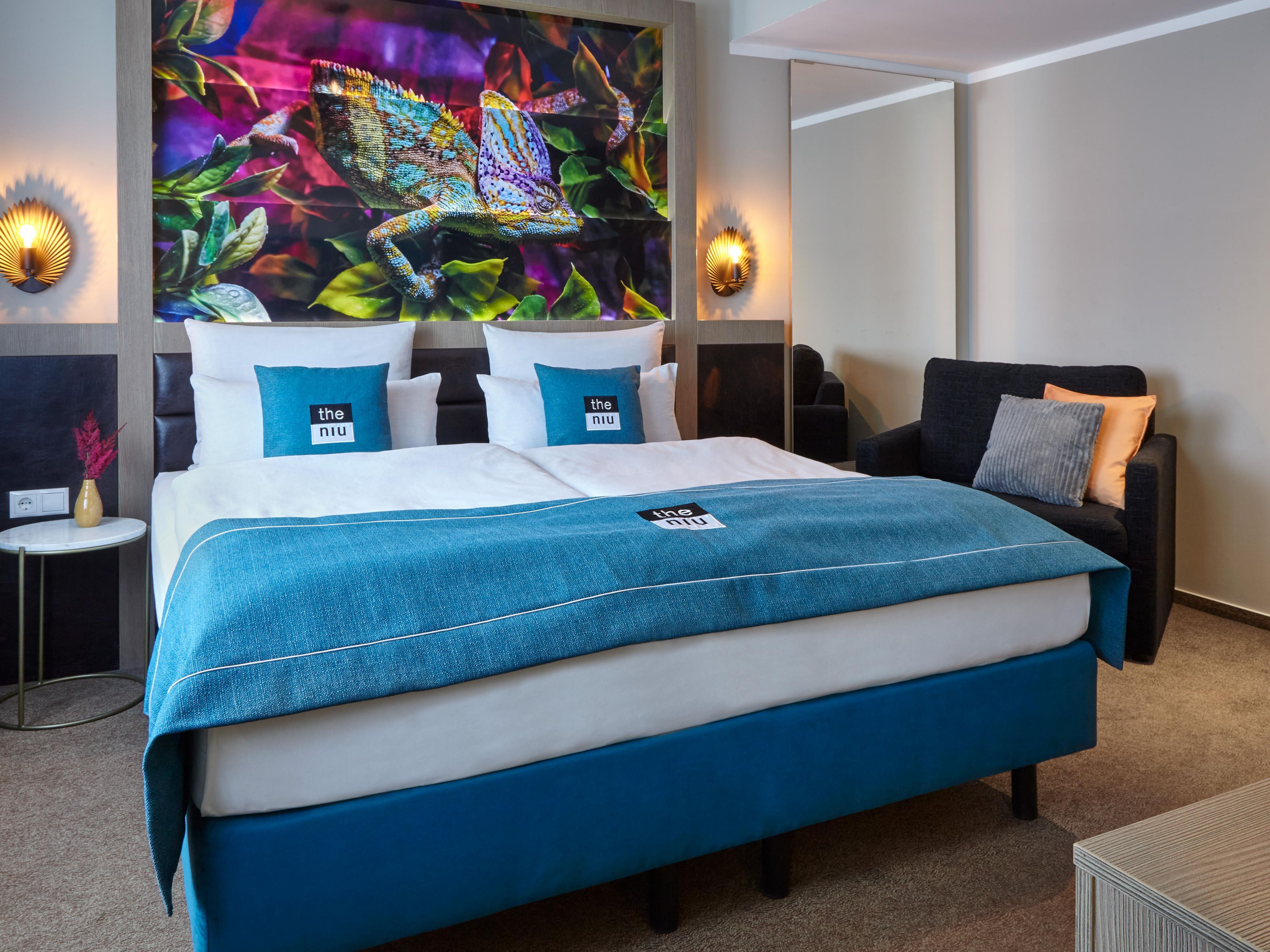 Comfortable Bed in Premium Room by Holiday Inn Fusion Hamburg