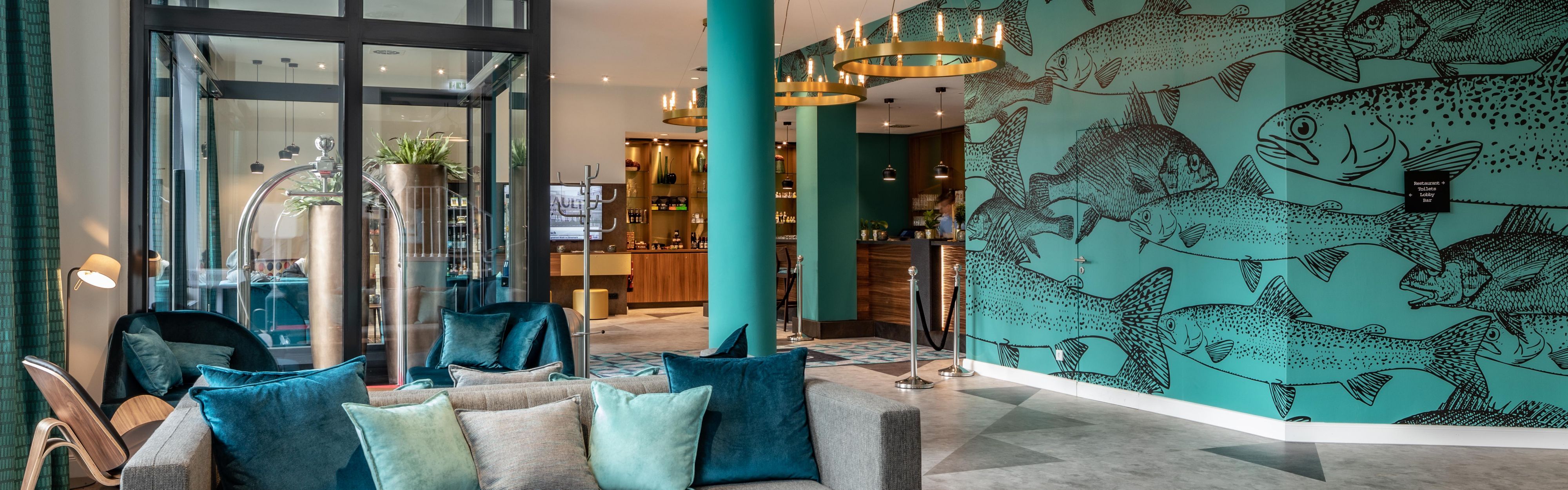 We welcome you in our lobby of Holiday Inn – the niu, Rig Lübeck