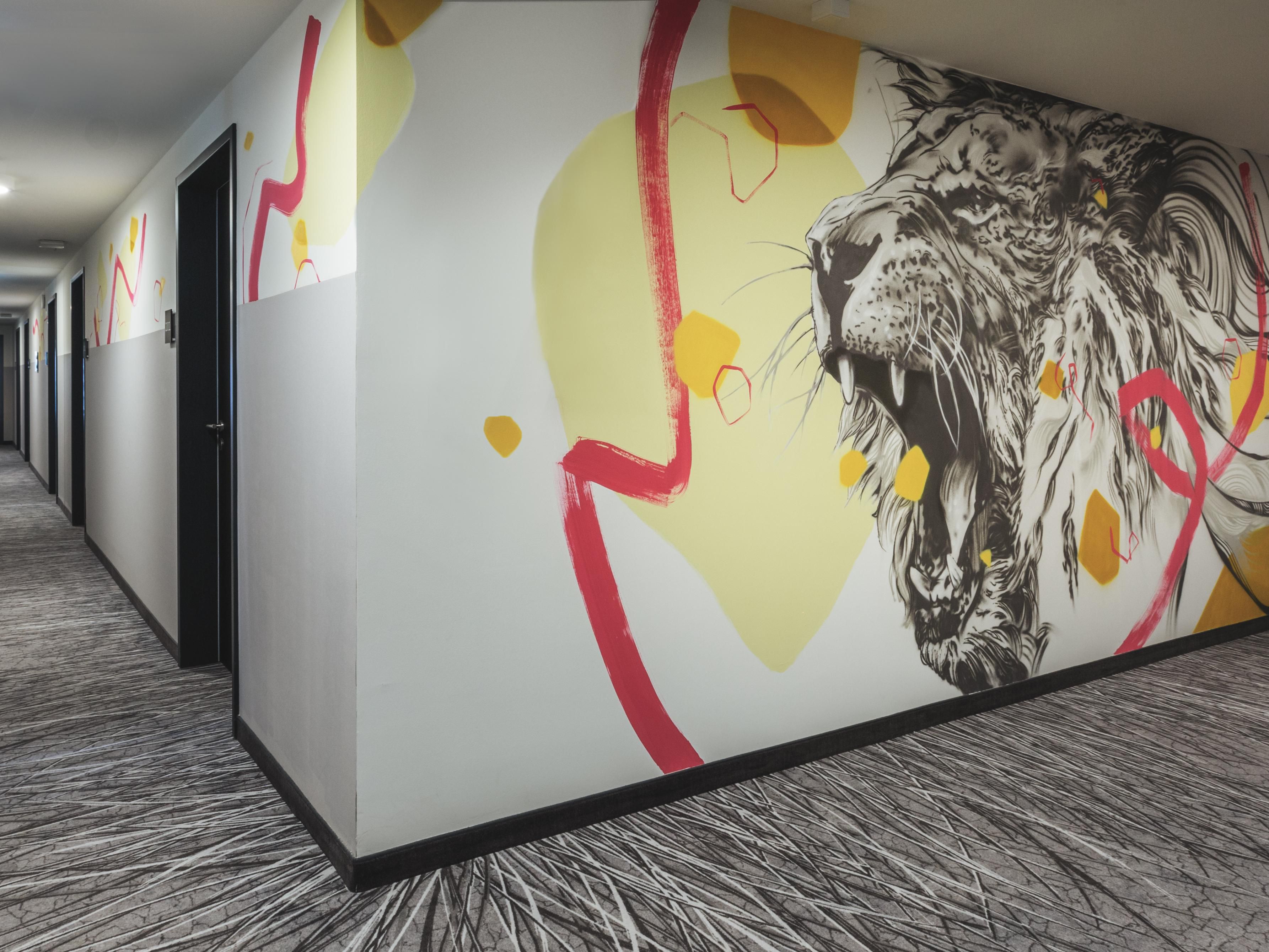 Designconcept of young hotel in Nuremberg. Artsy lion in Hallway.