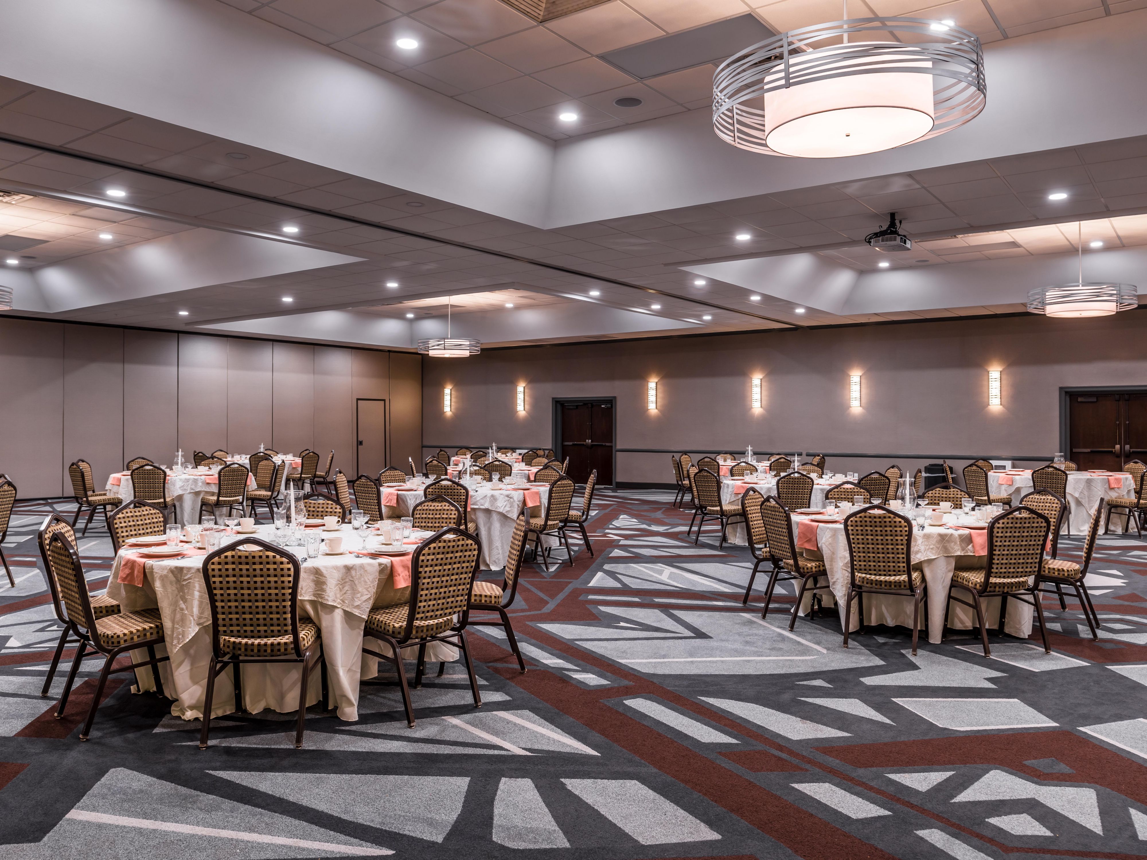 Big or small corporate meetings, intimate wedding, or a lavish event and reception, our hotel and its professional staff are trusted to ensure every detail is executed with perfection. Our beautiful newly renovated event space can accommodate up to 300 guests. We also offer discounts on wedding room blocks to host all of your family and friends.
