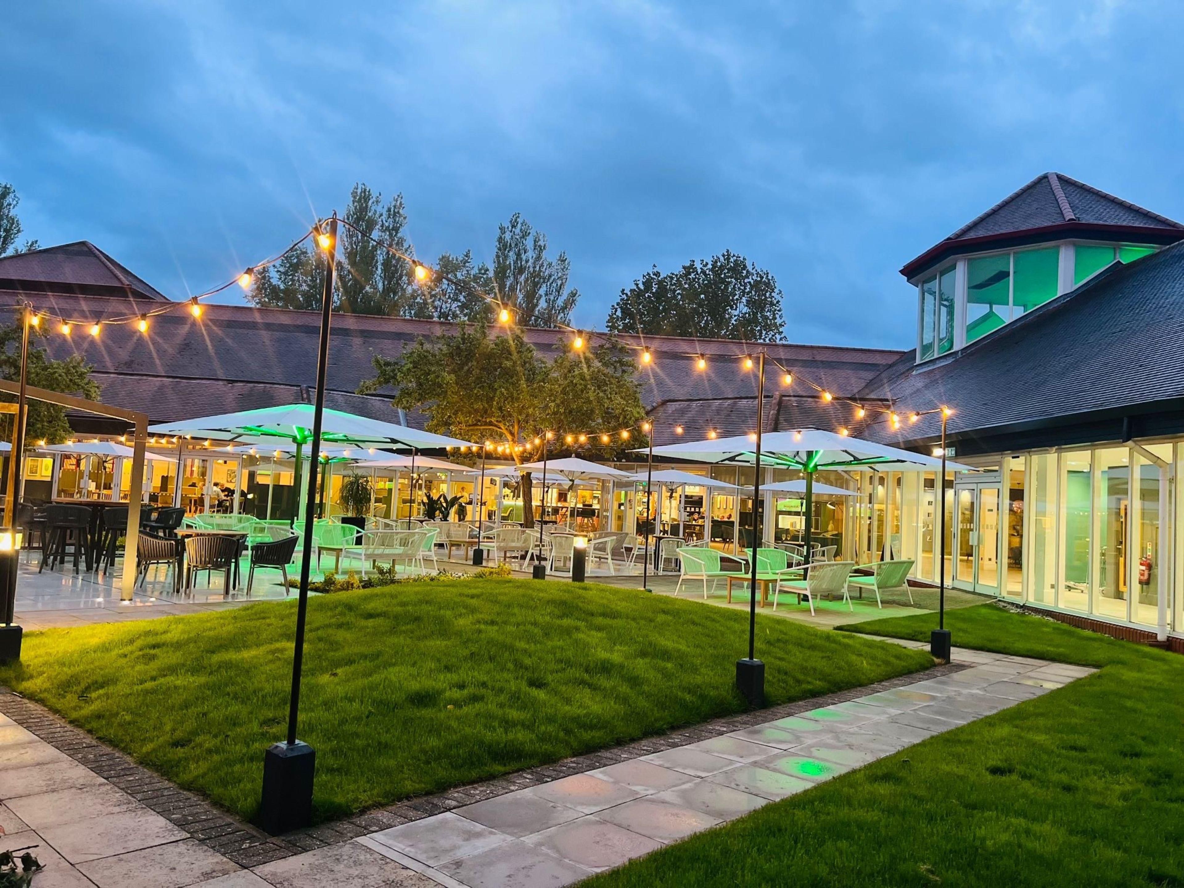 New outdoor venue, The COURTYARD, located within the hotel grounds, with lounge and bar stool seating is the ideal space for a refreshing drink, tapas, pizza or BBQ! Own menu gives additional choices when staying. Packages available for groups, unlimited pizza and live BBQs by our talented chef. 
Enquire with the events team for more info.