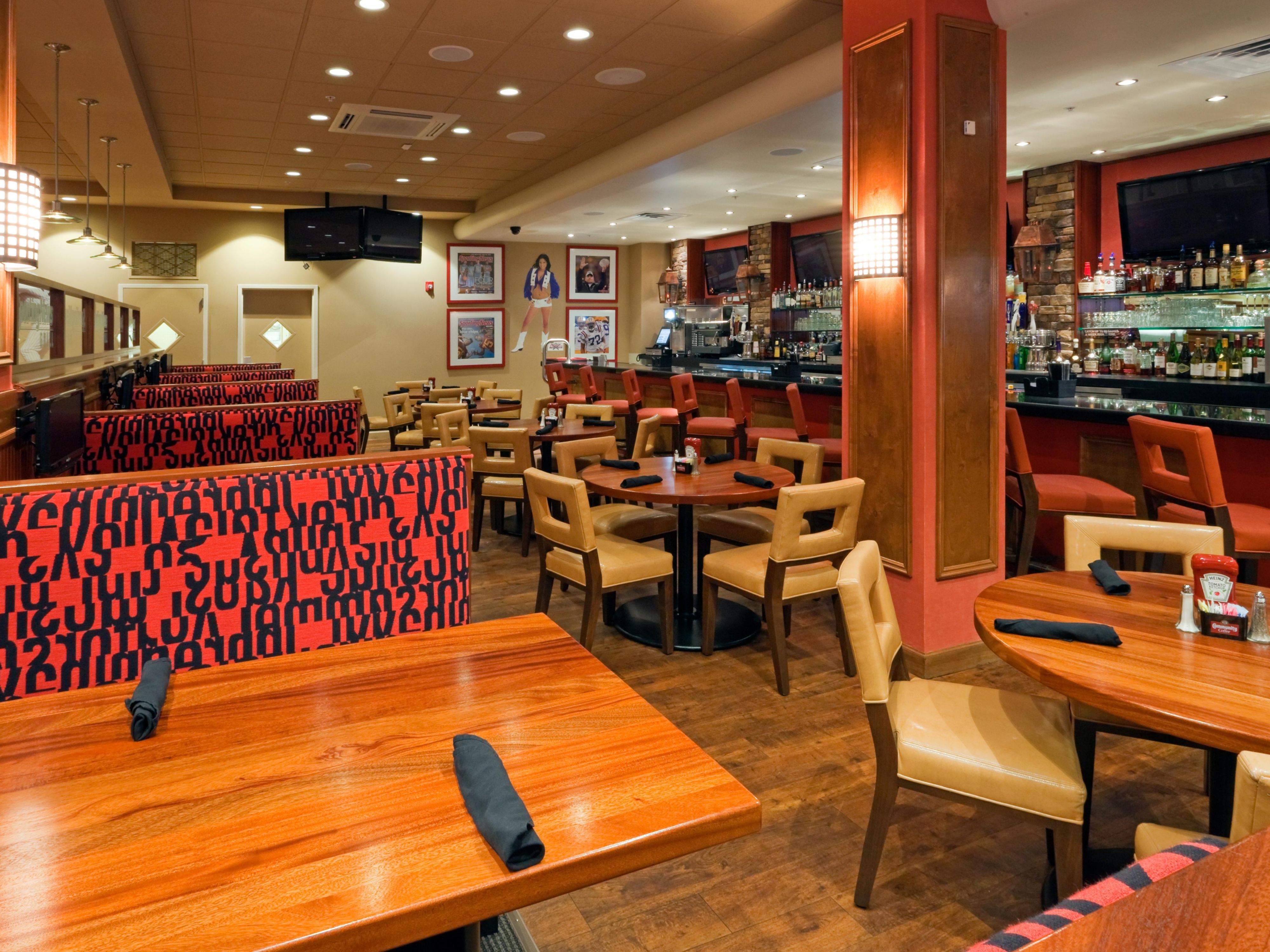Get in the zone at the Holiday Inn!  The Sport Zone, a pub and grill connected to the hotel, is open for breakfast and dinner everyday, and for lunch during sporting events.  Surrounded by over 25 flat-screen TVs, you are guaranteed a great seat to cheer on your favorite team while keeping an eye on your rivals.  Indulge in handcrafted cocktails, a