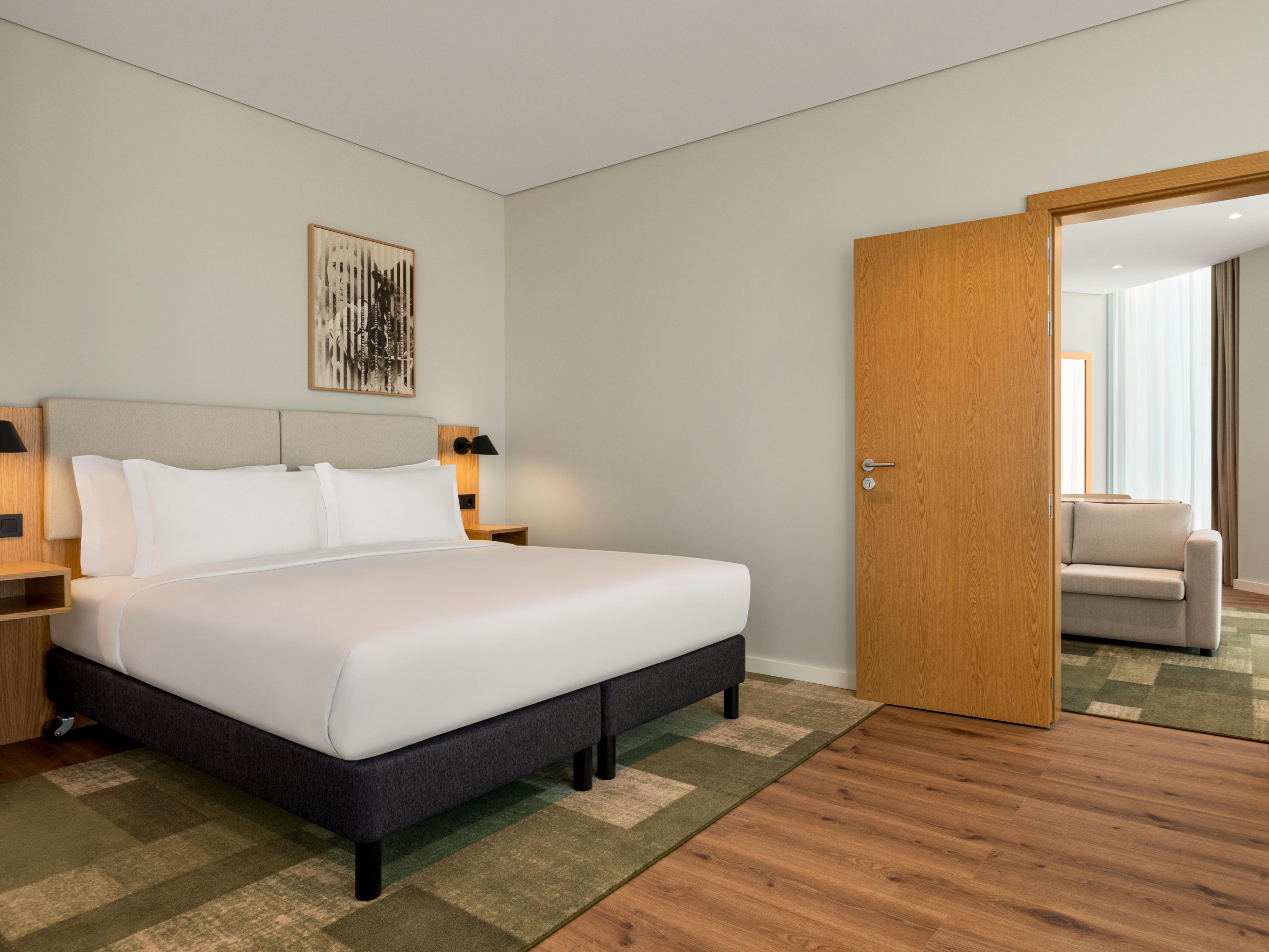 Experience the comfort of our One Bedroom Suites, designed for your relaxation. Each suite includes a mini bar, a single sofa bed, a separate living area, a private balcony, and a convenient walk-in shower. It’s the perfect place to unwind and feel at home during your stay.