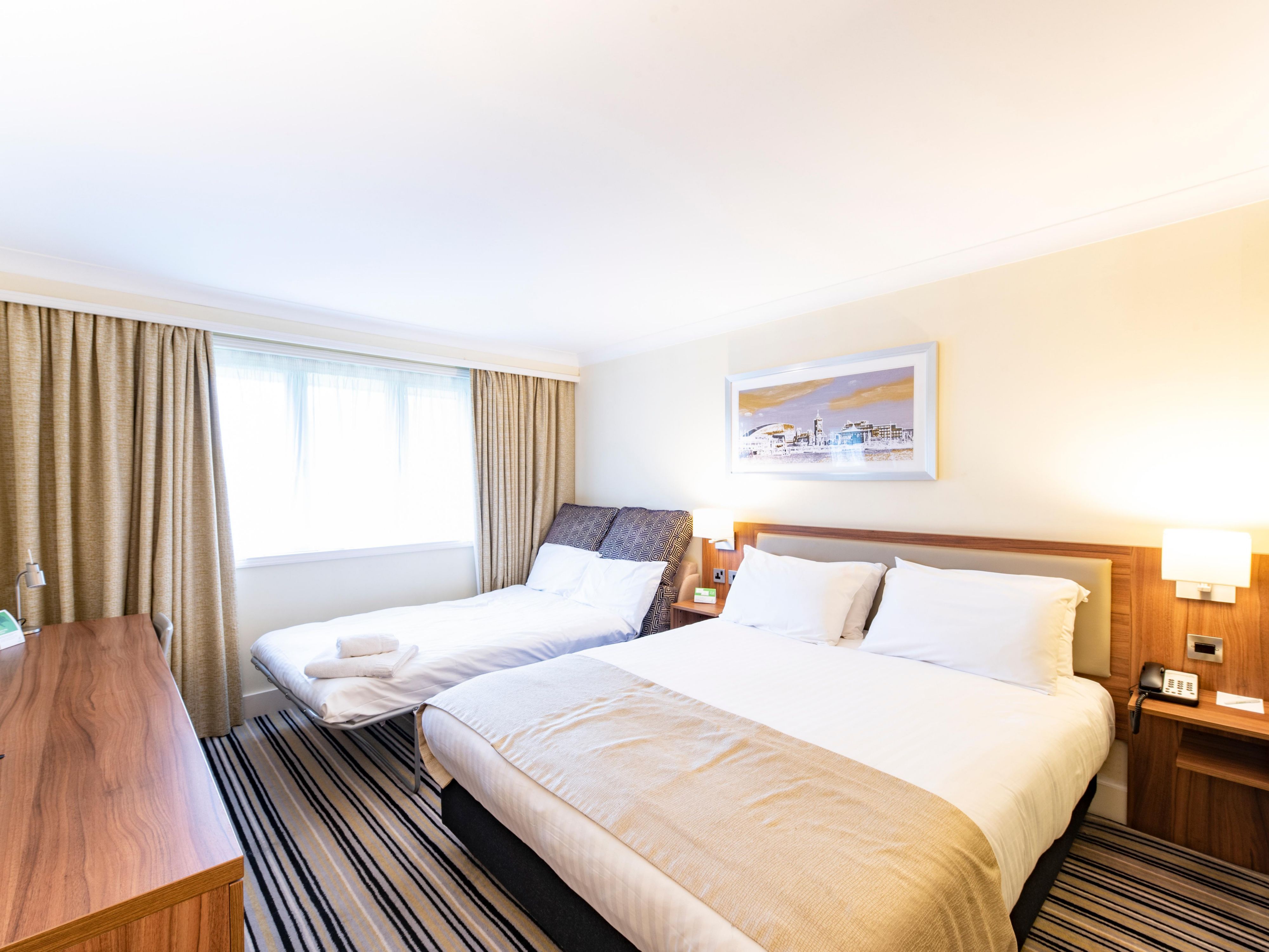 Take advantage of our well equipment family rooms which offer double and sofa pull out beds for up to two adults and 2 children ( up to the age of 12). Take advantage of children eat free IHG programme 