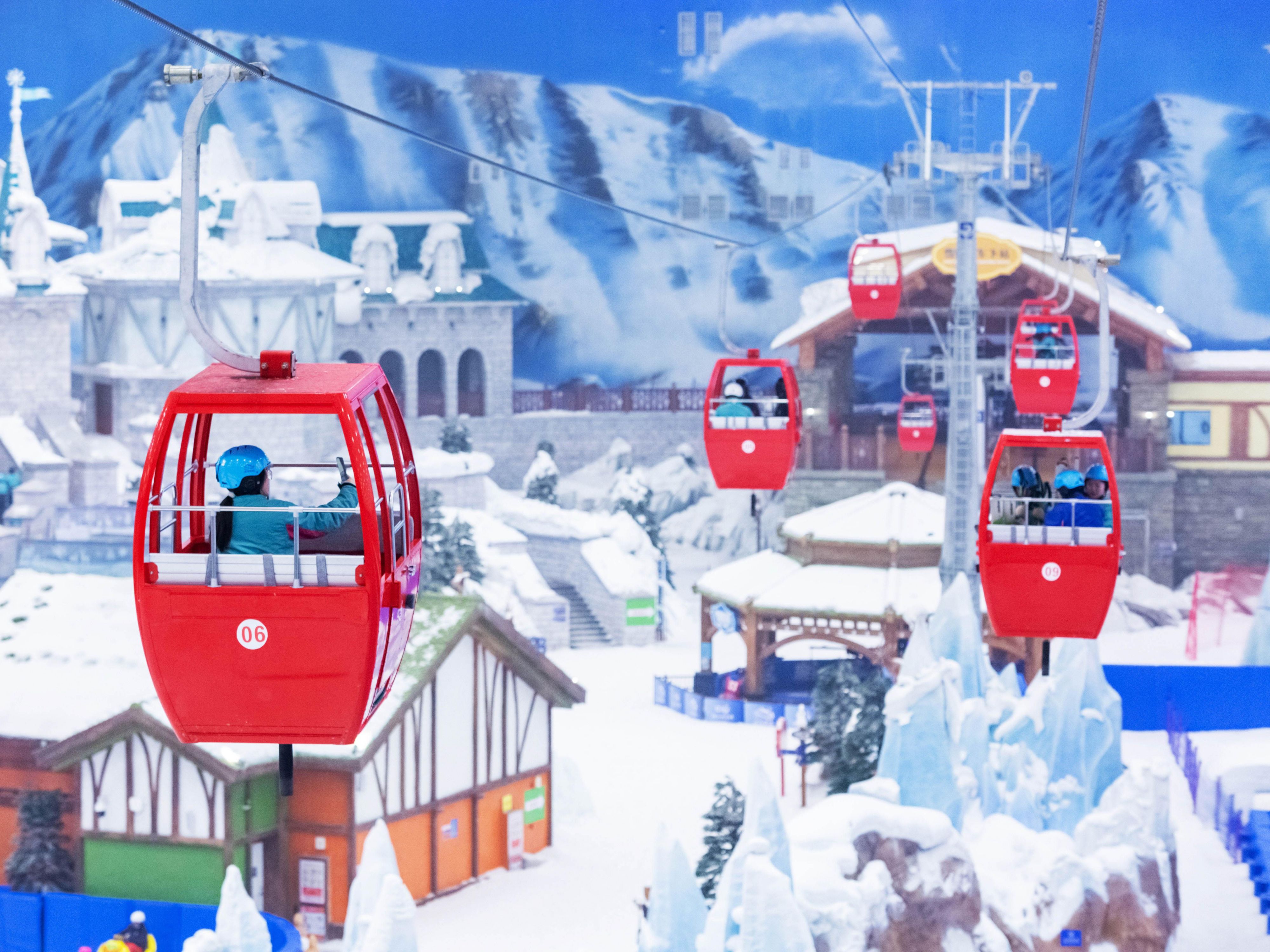 A romantic snowy country suspended above a hundred meter deep pit.