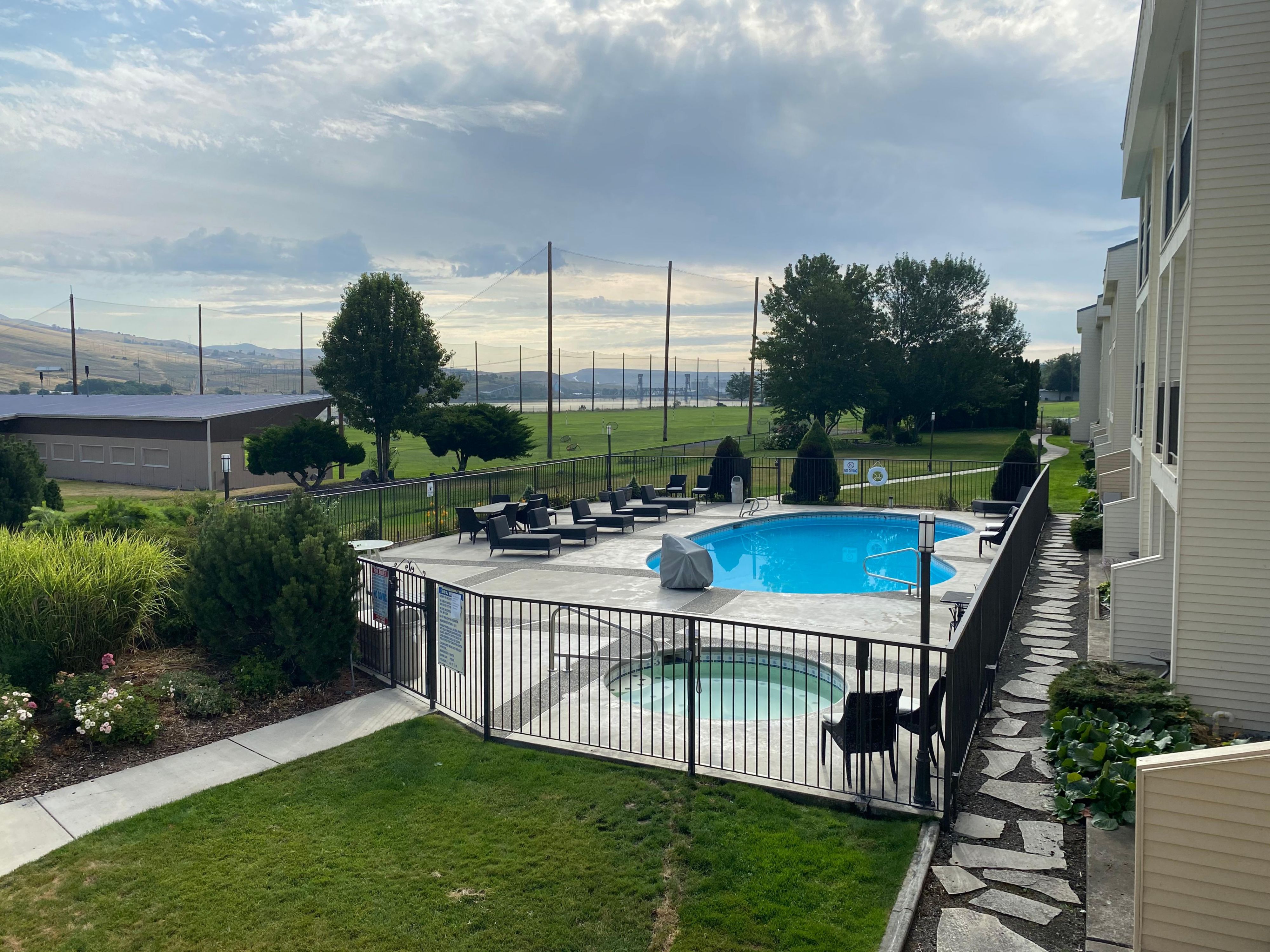 View from the patio of the driving range and pool area