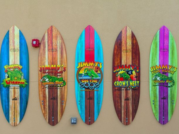 Four illustrated surfboards