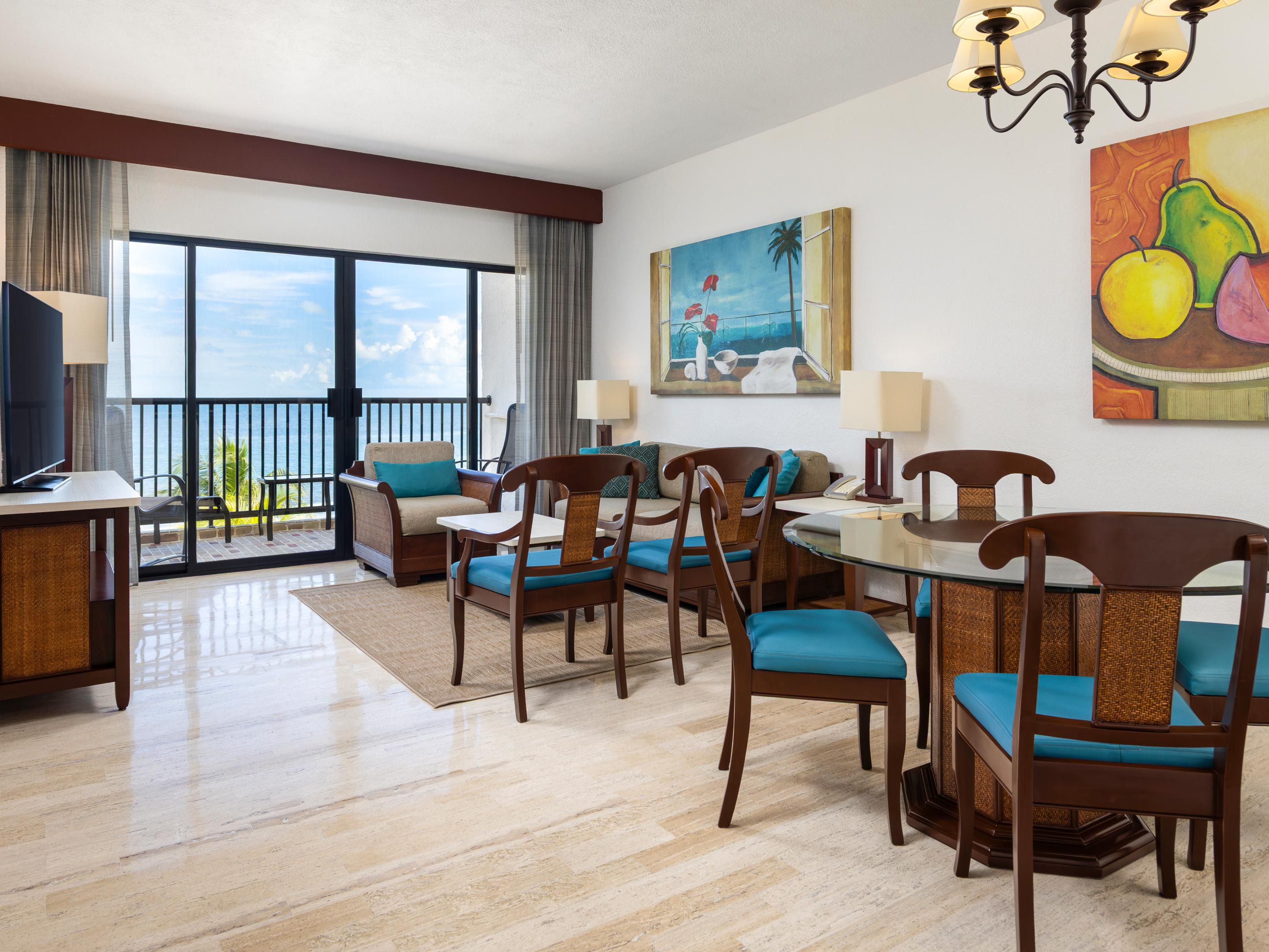 Two-bedroom oceanview villa with airy living and dining room.