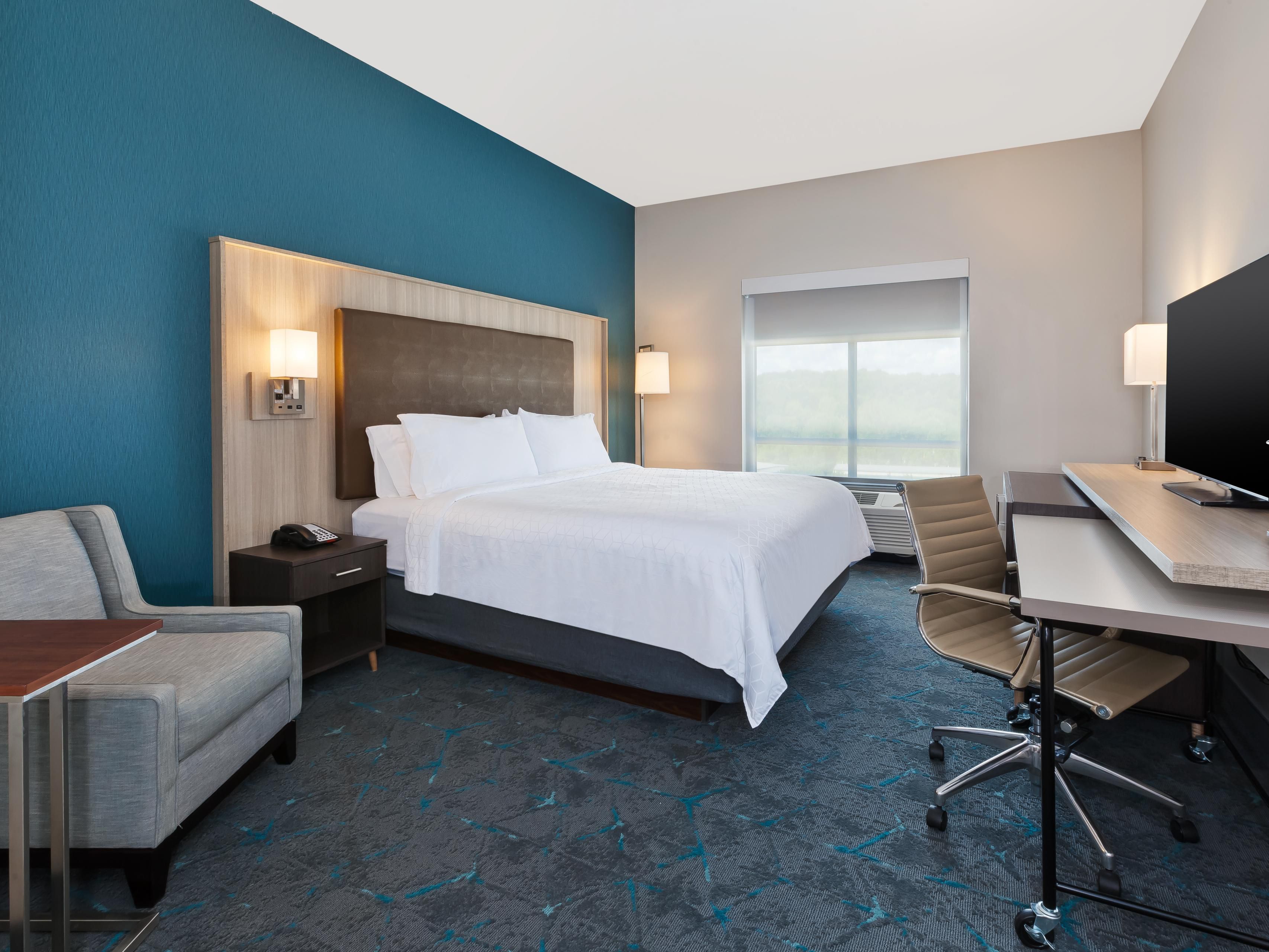 Pull back the covers, hop in, and catch your favorite TV show.