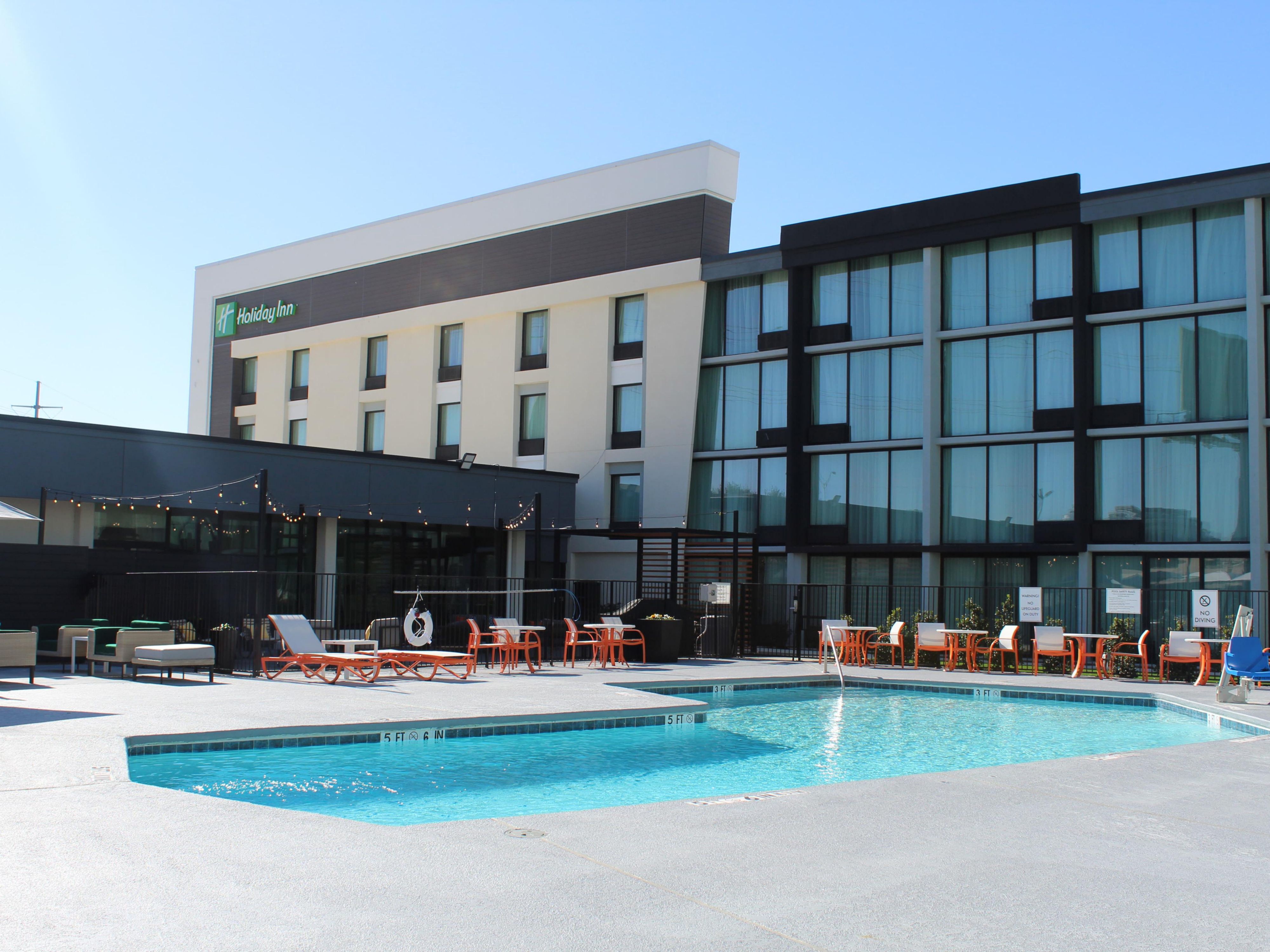 Enjoy our outdoor pool oasis with lounges and cabanas. 
