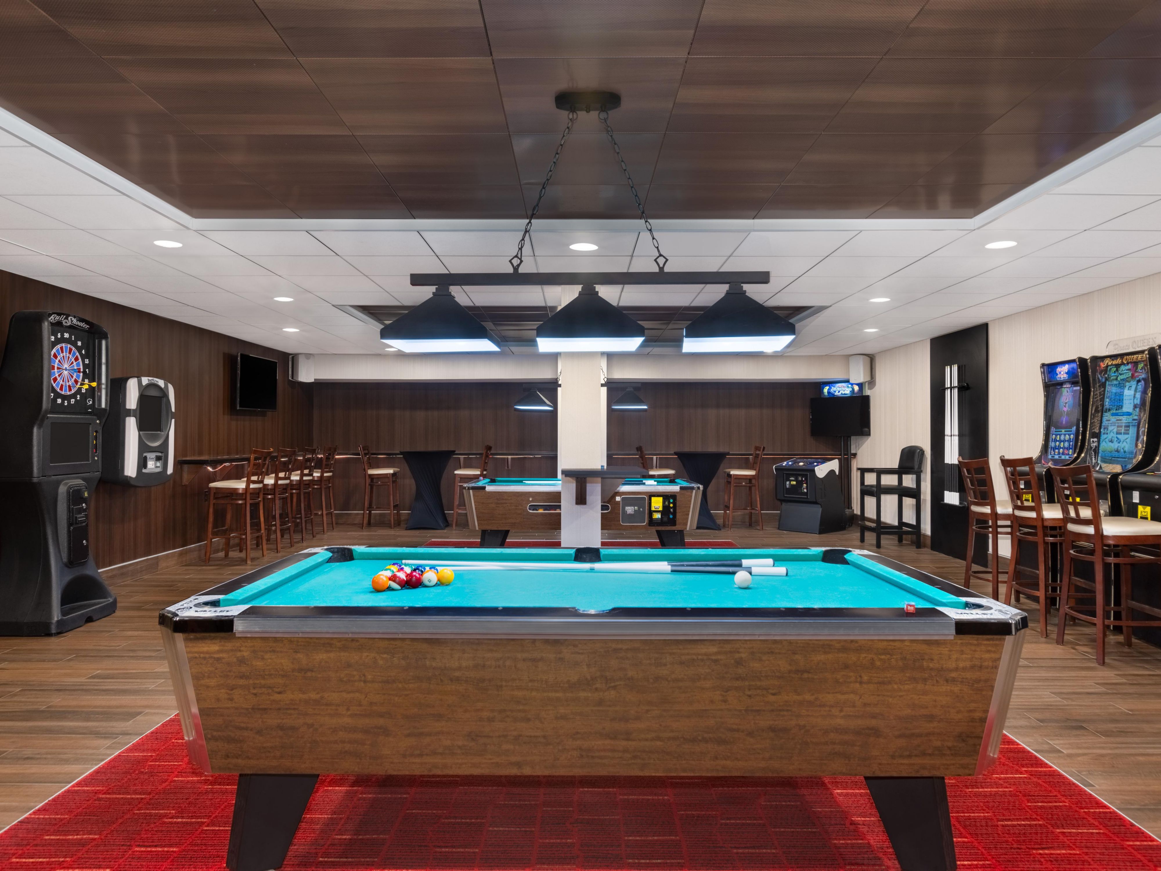Welcome to Holiday Inn Des Moines Airport/Conf Center. Enjoy our tropical courtyard with an indoor pool, whirlpool, and a state-of-the-art fitness center. Business travelers can access major companies and versatile meeting spaces. Unwind at our Lobby Bar and hidden Speakeasy with TVs, pool tables, Golden Tee golf, darts, bowling, and a jukebox.