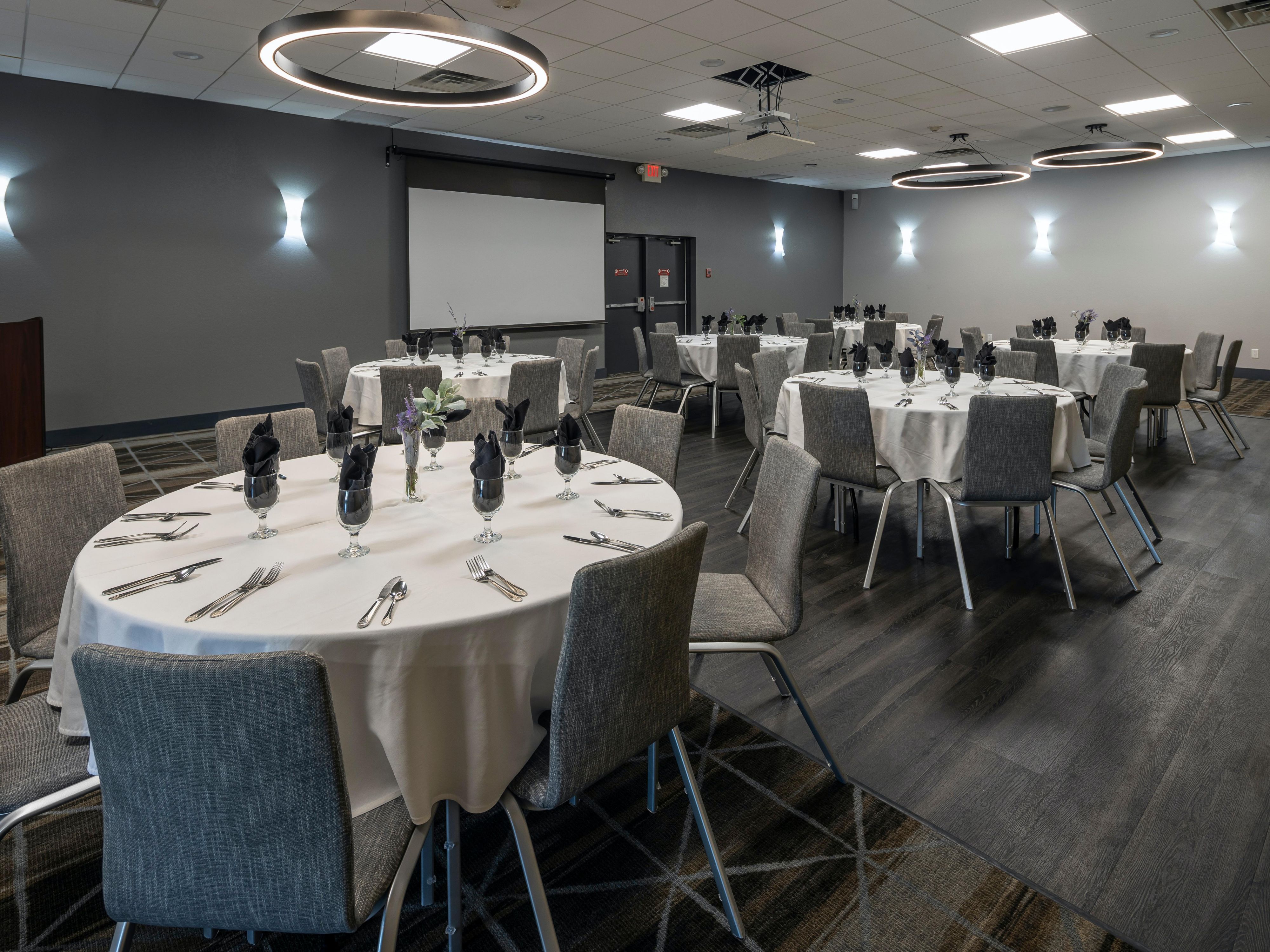 We have five meeting rooms that total 3,150 square feet and such amenities as a piano, a professional events planner, A/V cart, screens and rentable projectors and more. We are ready to host any type of event, from a wedding to a corporate meeting to a sports team.  In-house catering only.