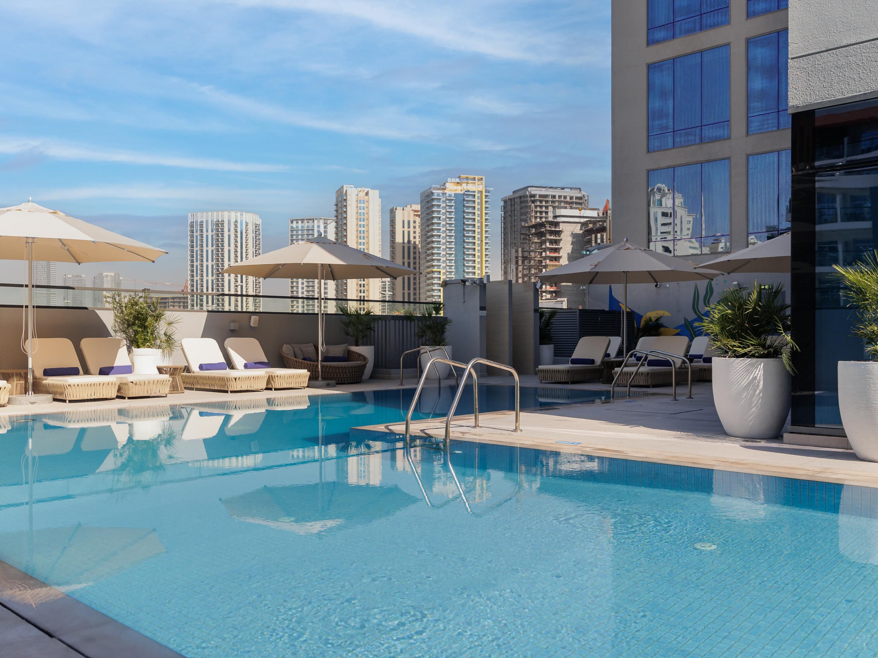 Reconnect and restore at our Mediterranean-inspired beach club, with sun loungers, private cabanas, pool, and private beach access. Enhance your beach retreat with our signature dining experiences, amidst sweeping coastal views, just a short drive away
