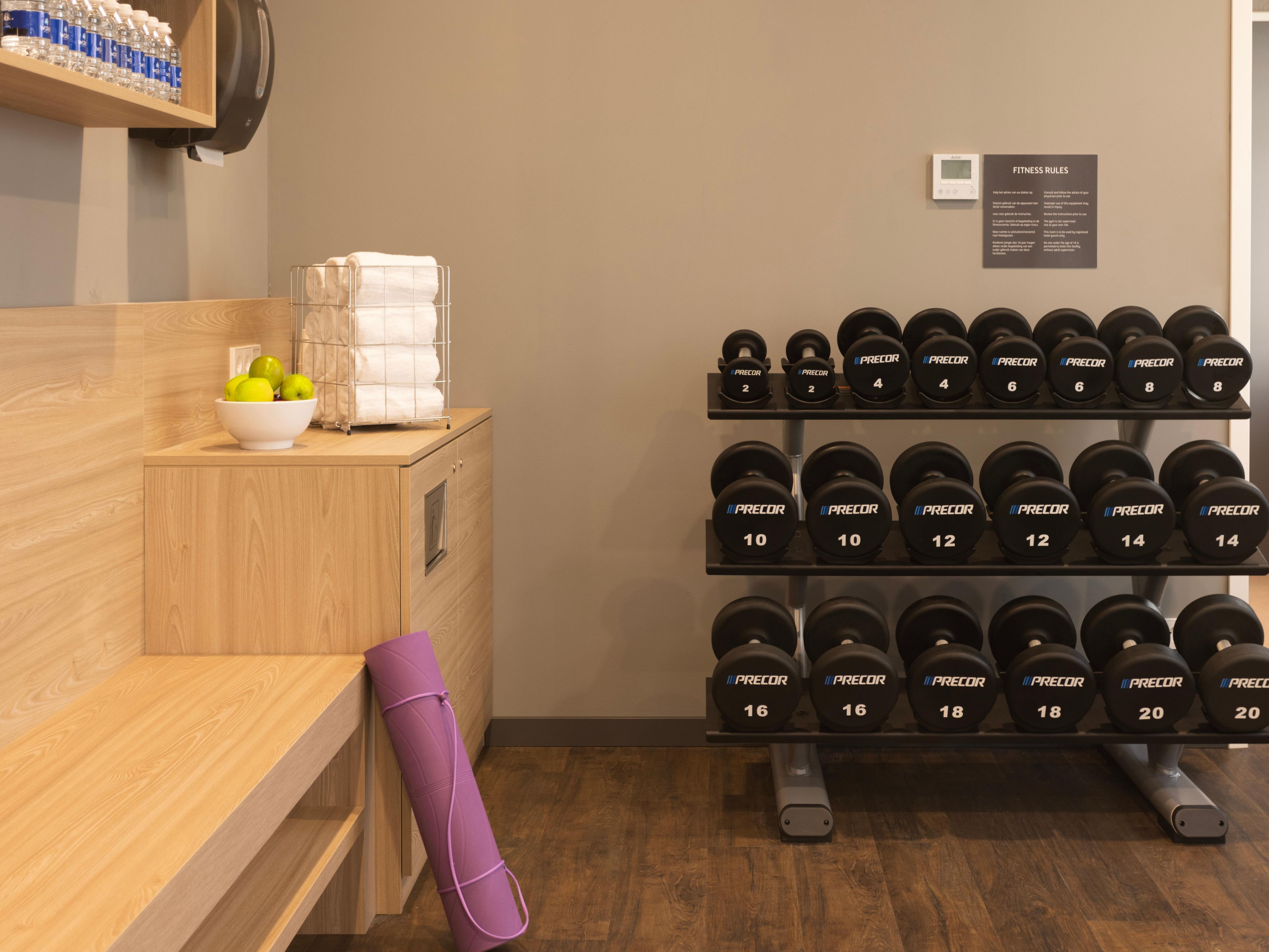 Lift weights or practice yoga in our gym room.