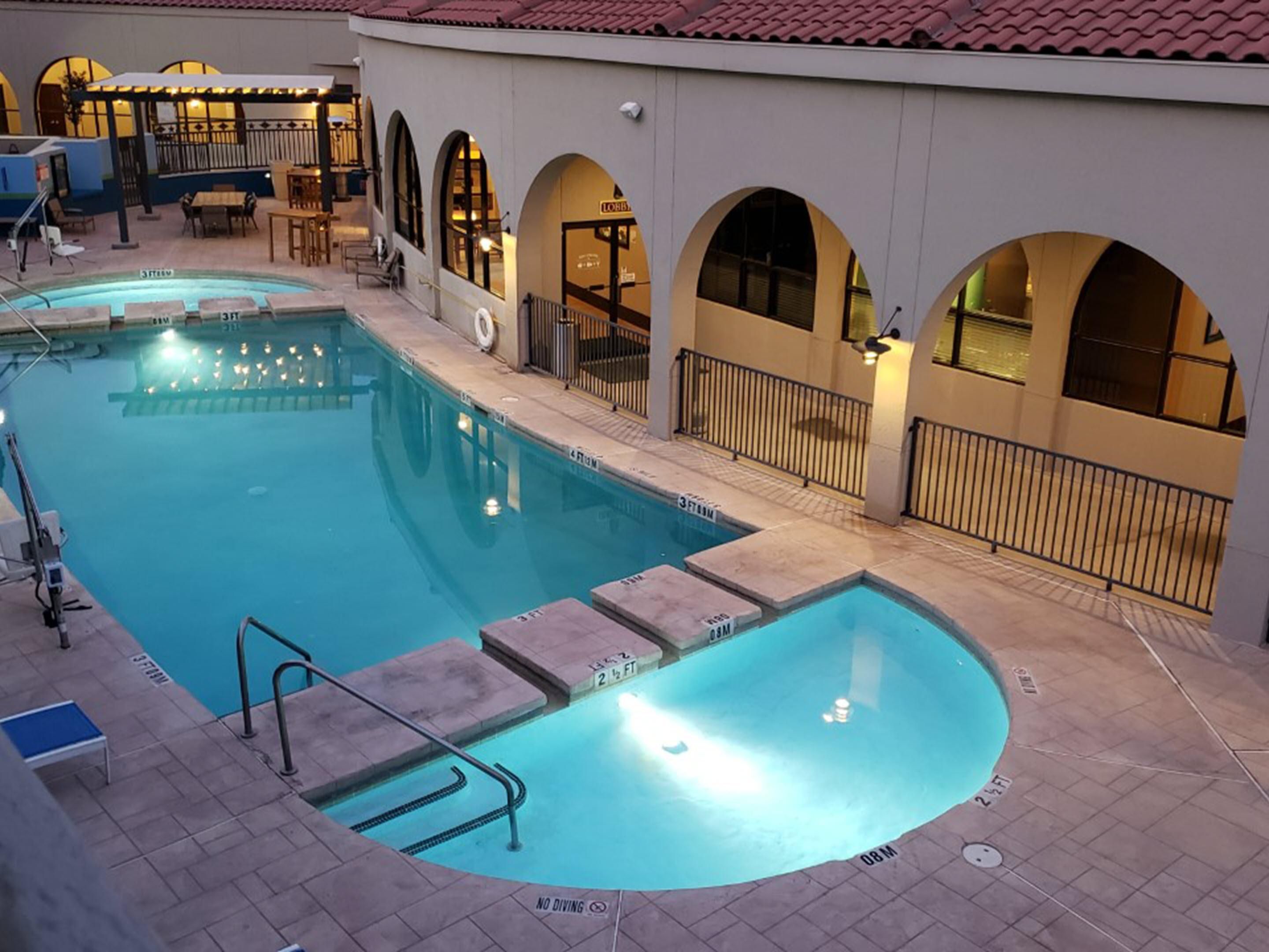 Cool down and take a dip in our refreshing outdoor pool, equipped with comfortable poolside seating. Enjoy some rest and relaxation during your stay.