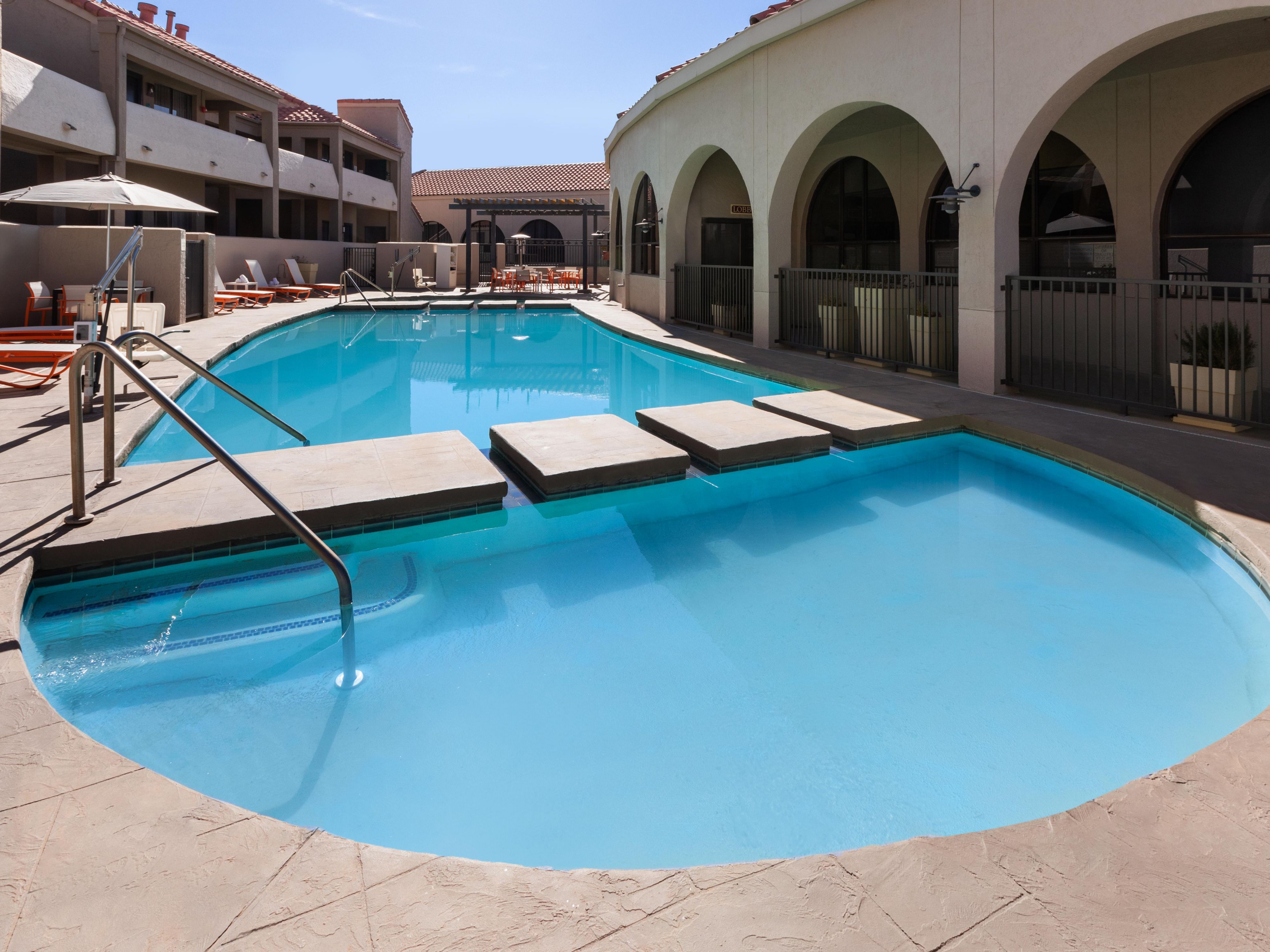 Cool down and take a dip in our refreshing outdoor pool, equipped with comfortable poolside seating. Enjoy some rest and relaxation during your stay.