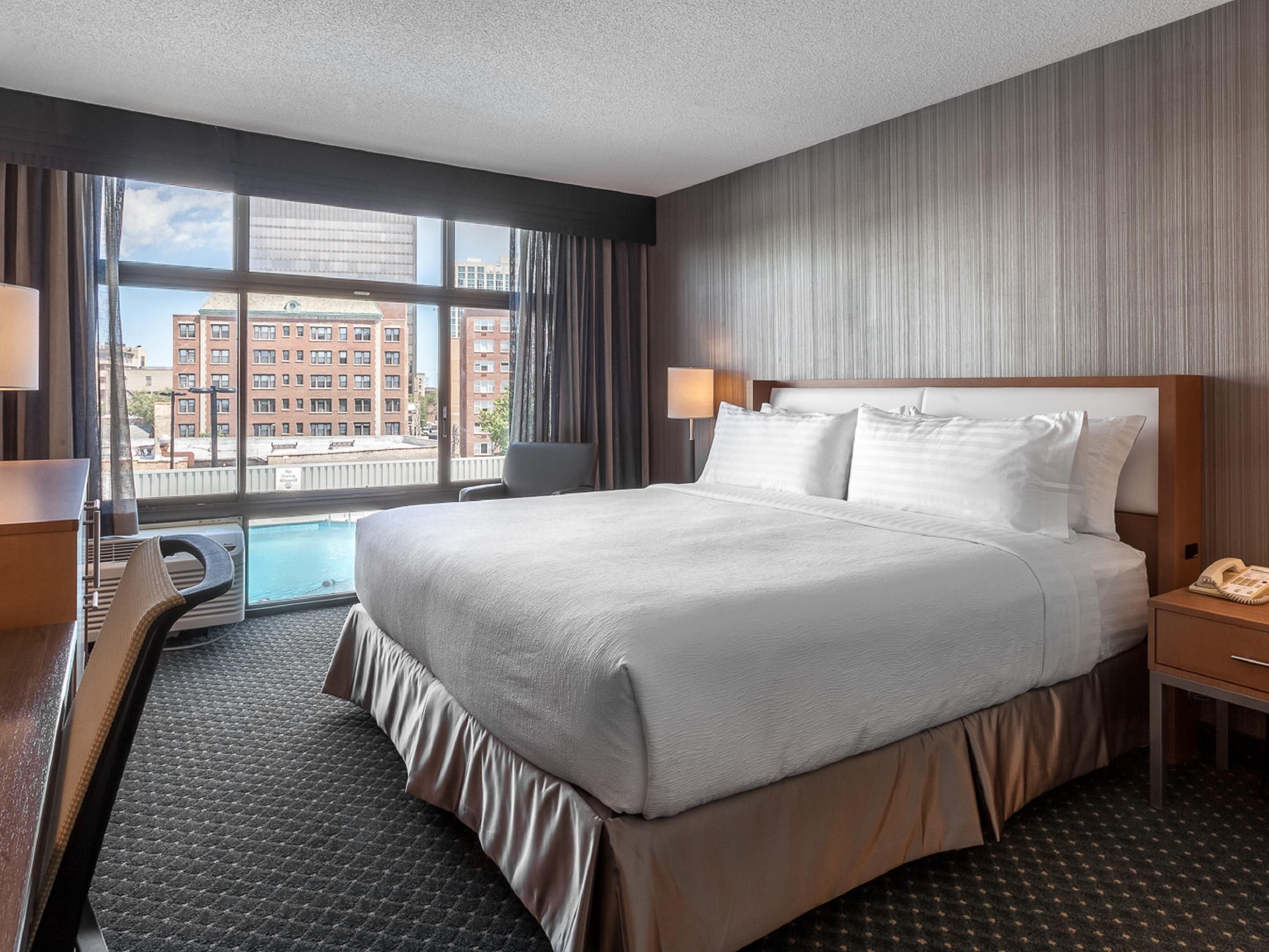 Enjoy a comfortable room and take a dip in our seasonal pool