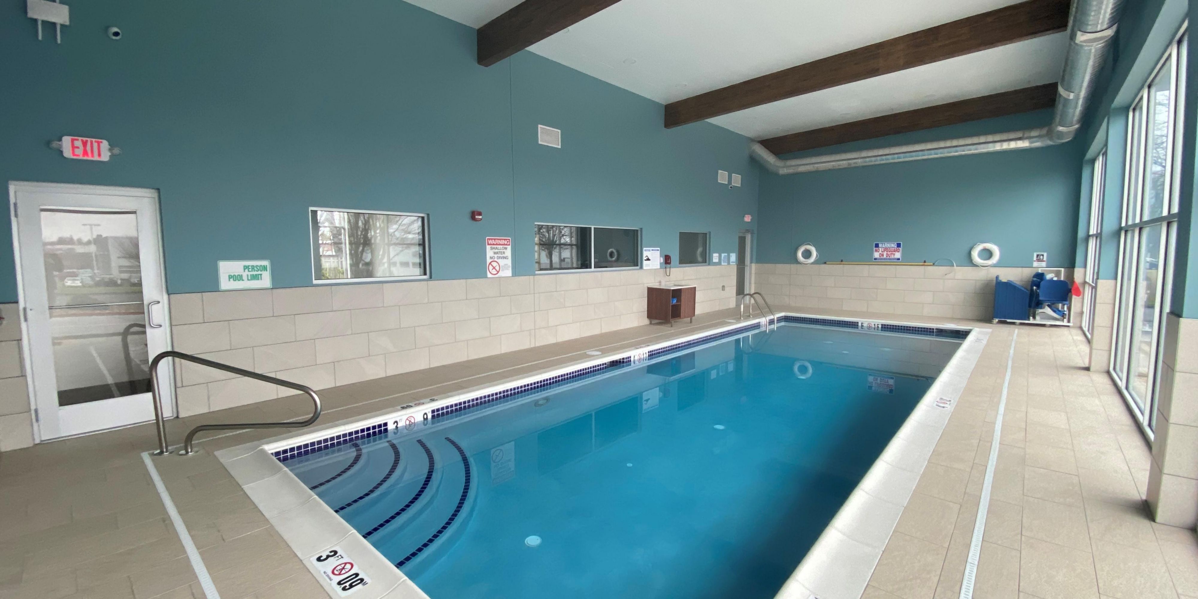 Take a dip in our relaxing, heated pool. The plentiful natural light, exposed beams, and calming colors will help you unwind from your day. It is attached to the fitness center for your total wellness convenience.