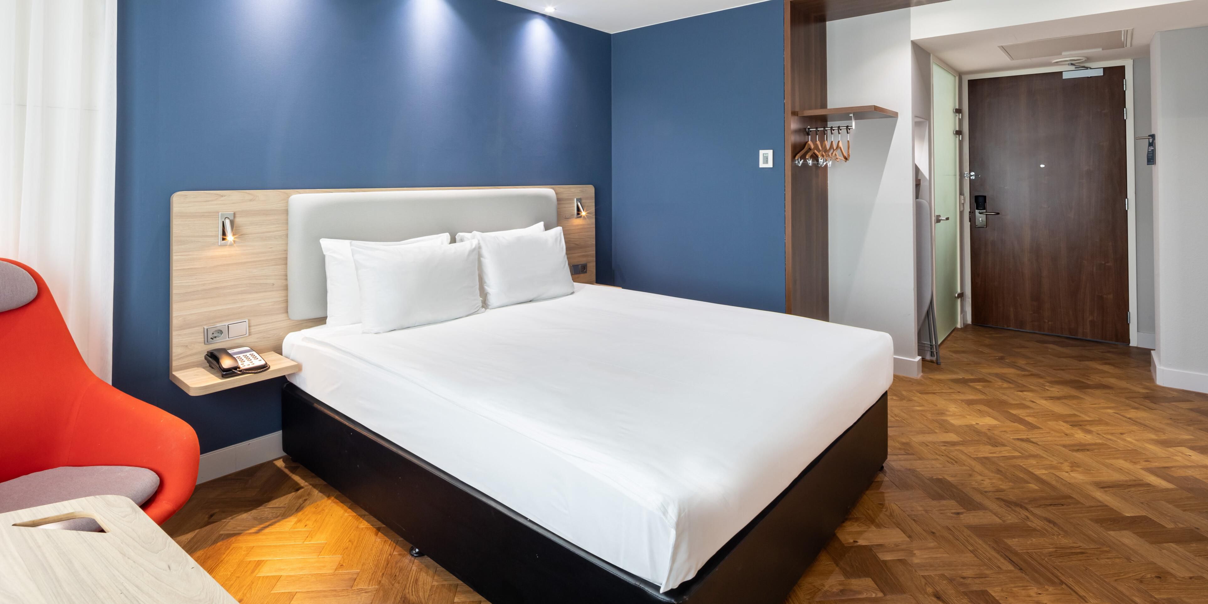 Decorated with blonde-wood accents and dashes of red, the hotel’s 7th floor Scandinavian-inspired rooms include air-conditioning, power showers and high-quality beds. Business Guest Rooms pair a table with a flexible work chair.