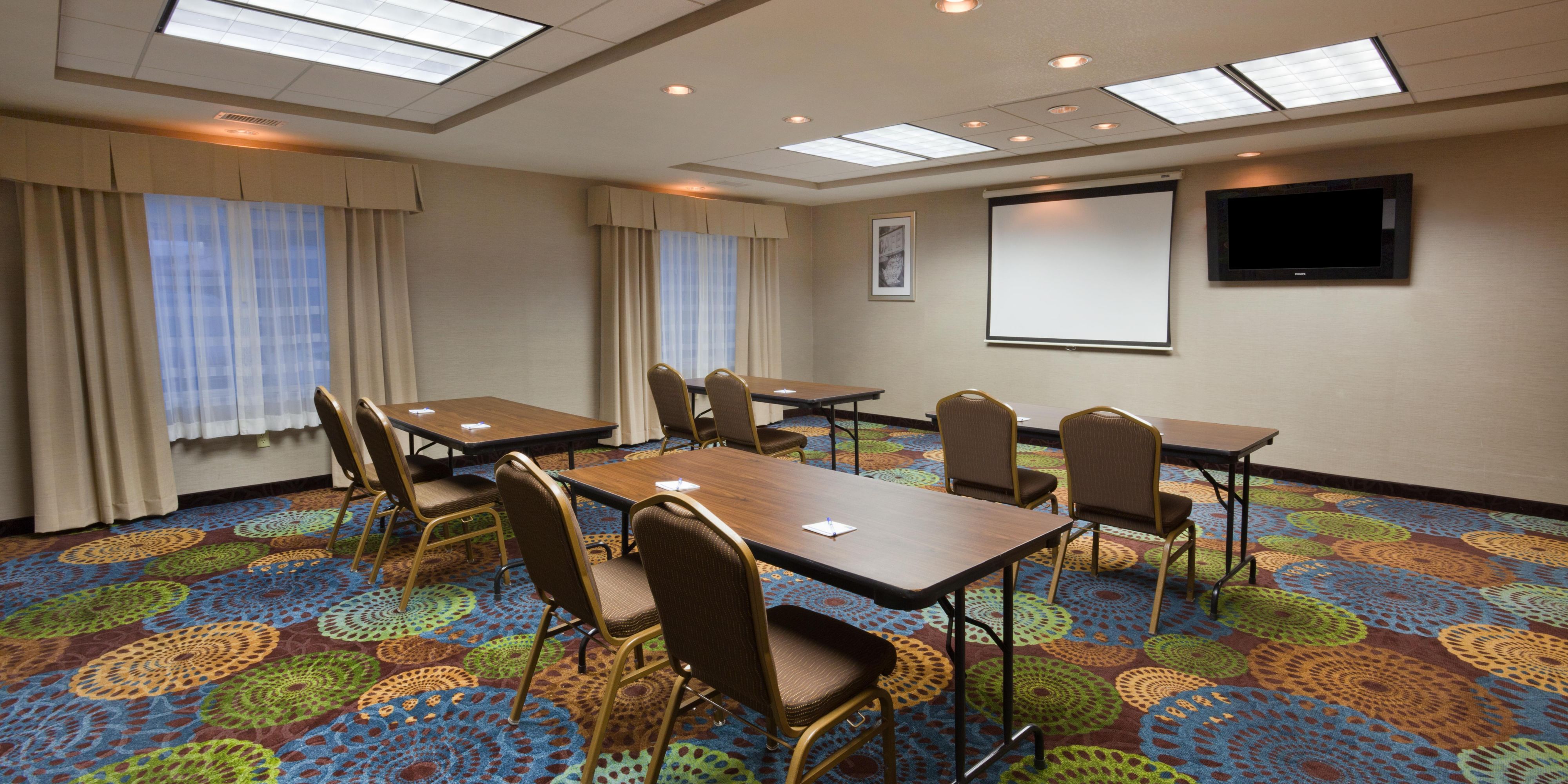 Plan your next event and meeting with us. Our event space provides 720 sq ft of flexible space. Displayed, is a classroom set-up. However, our hotel staff will provide a space to suit your needs, from banquets to presentations, we will accommodate. Our meeting room can even be used to prepare for an event at the attached Dakota Event Center.   