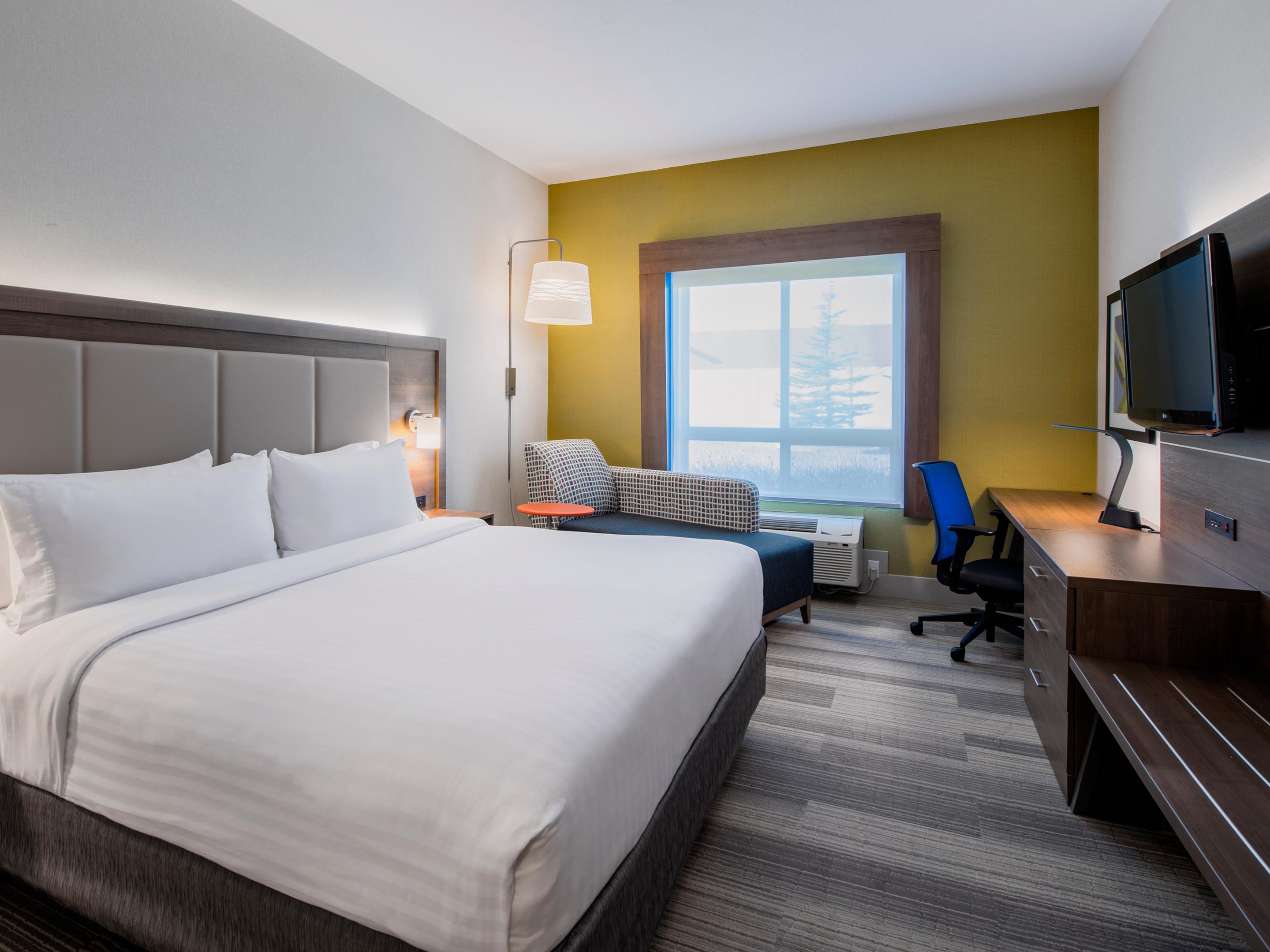 Enjoy comfort and style in our king guest room