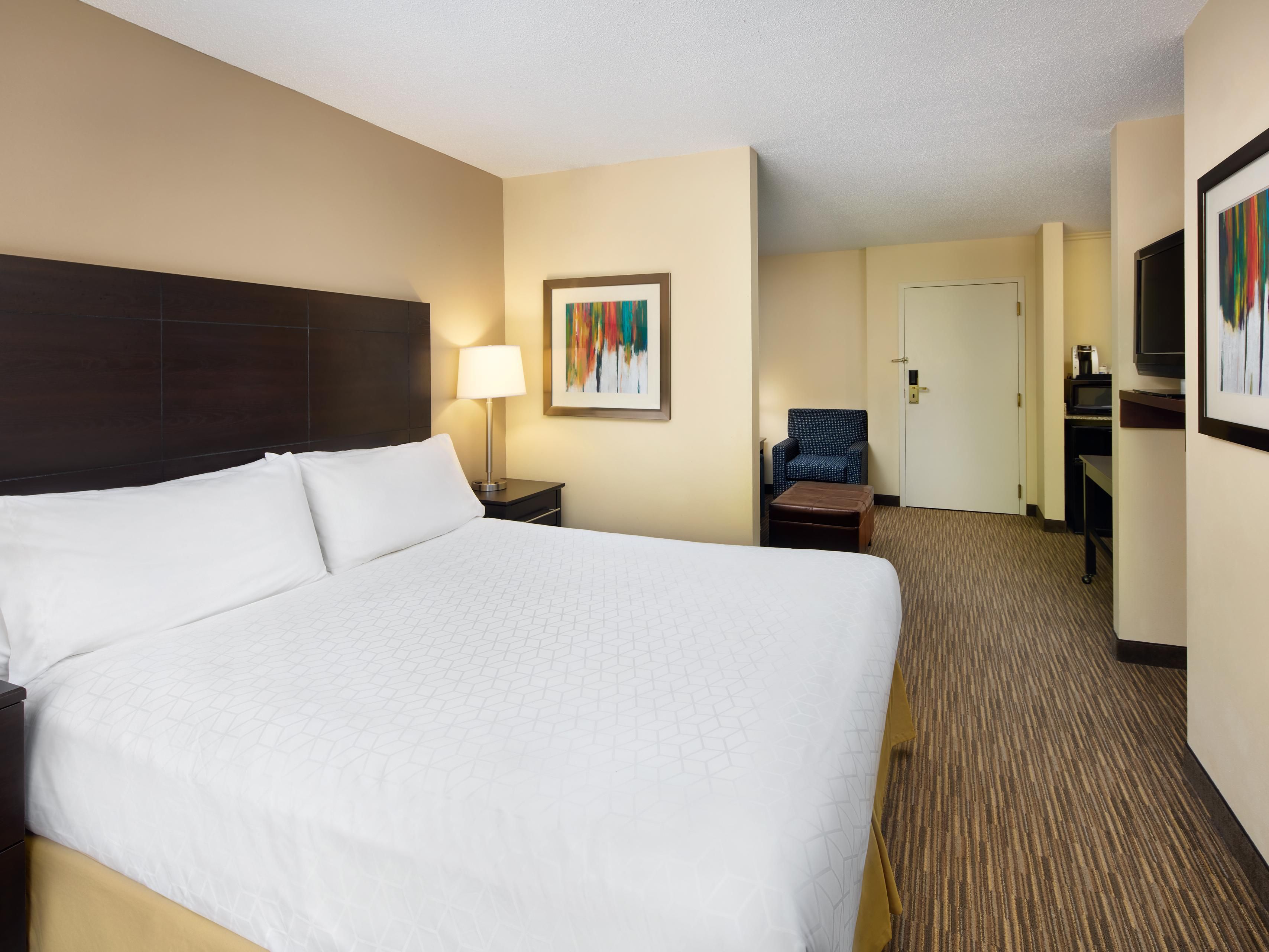 Spacious ADA king bed room with pull out sofa.