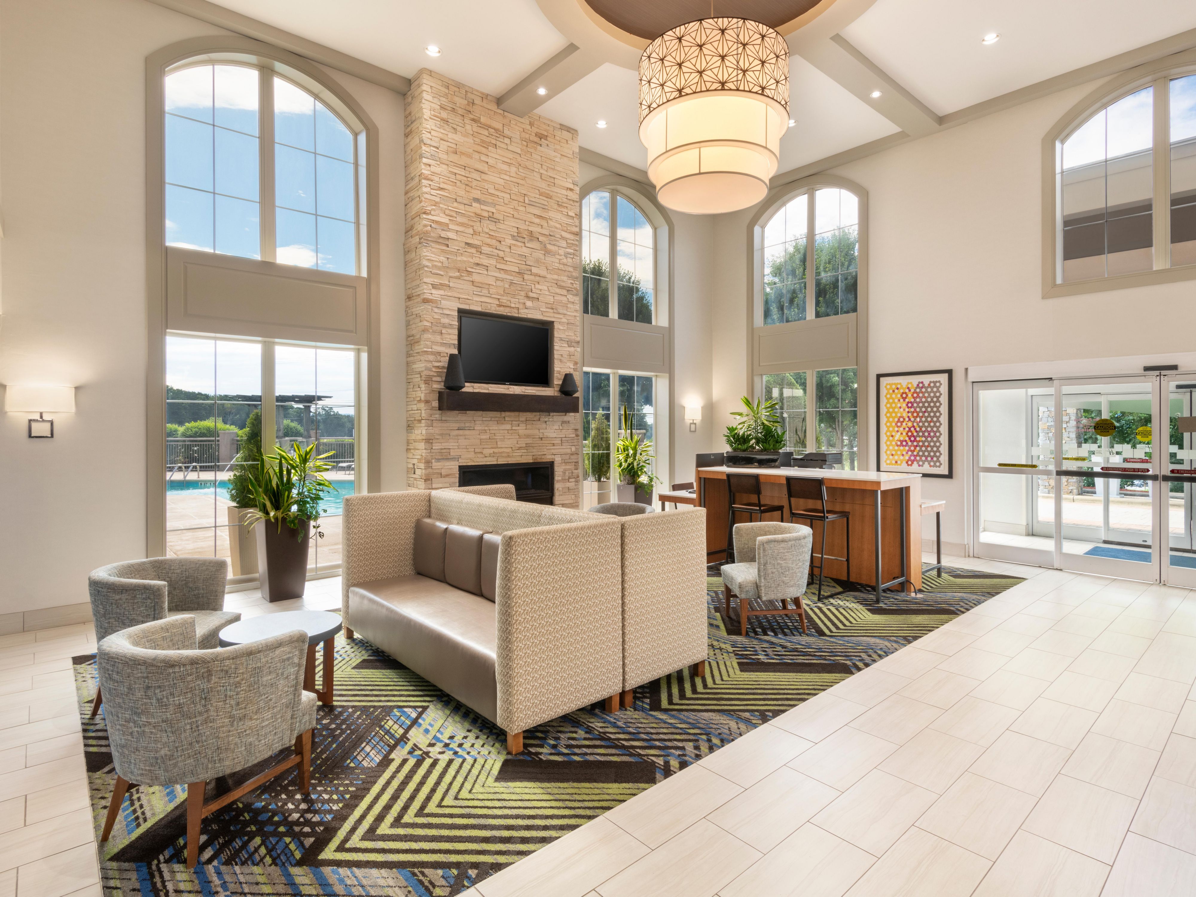 Stay smart and rest easy in our stylish and comfortable hotel in Asheville. With thoughtful touches designed for today’s travelers, relax in our fresh contemporary guest rooms, meet with friends in our lobby, or plan a small meeting in our well-appointed event space. Across from the Tanger Outlet Mall with ample shopping opportunities.