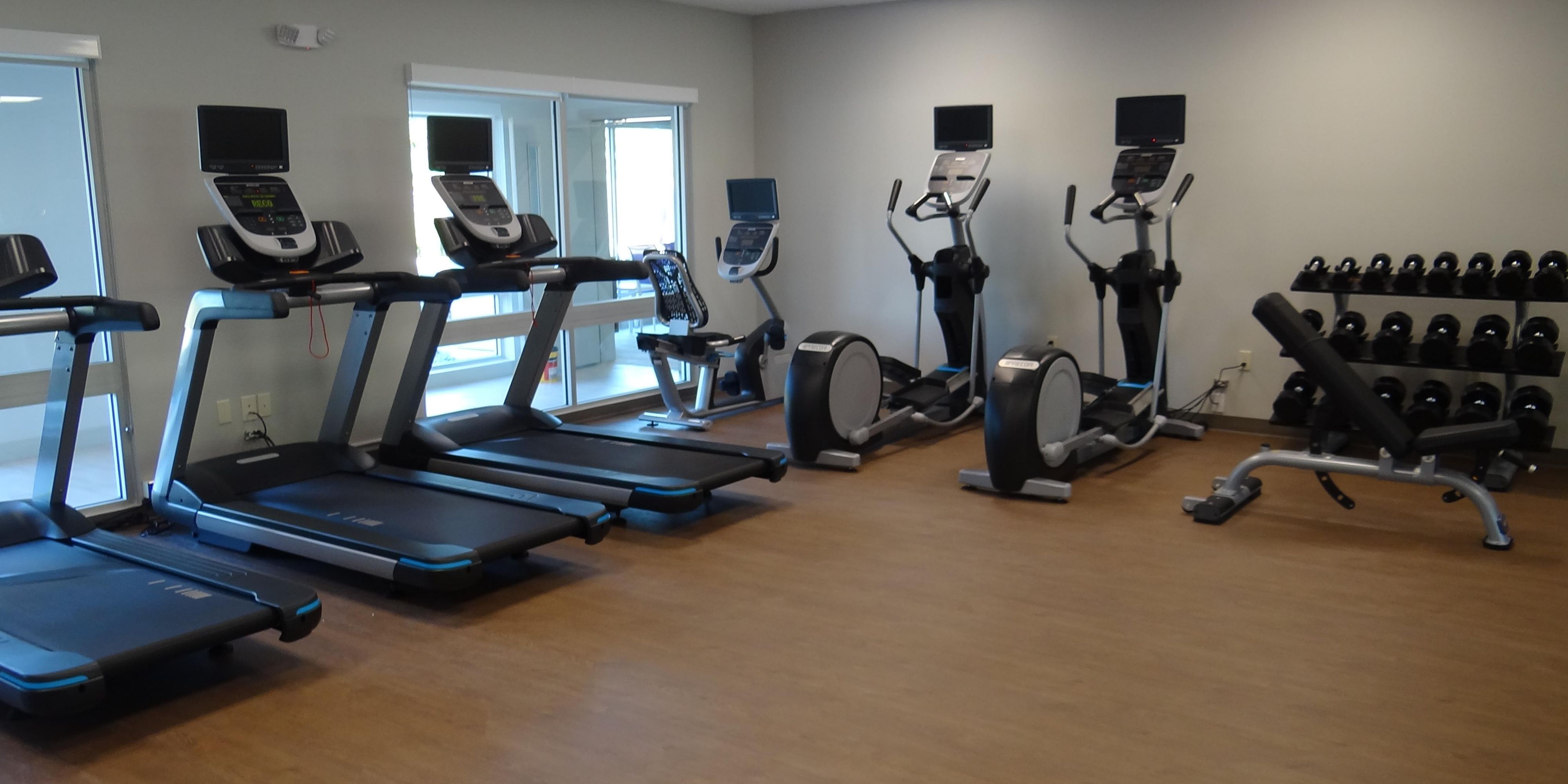 Get energized...work out with the latest equipment in our large fitness center, featuring treadmills, elliptical, reclining bike, free weights and more!  Screens on each machine make it easy to program your workout for optimal results...or catch up on the latest news or your favorite show...to make your workout a breeze!