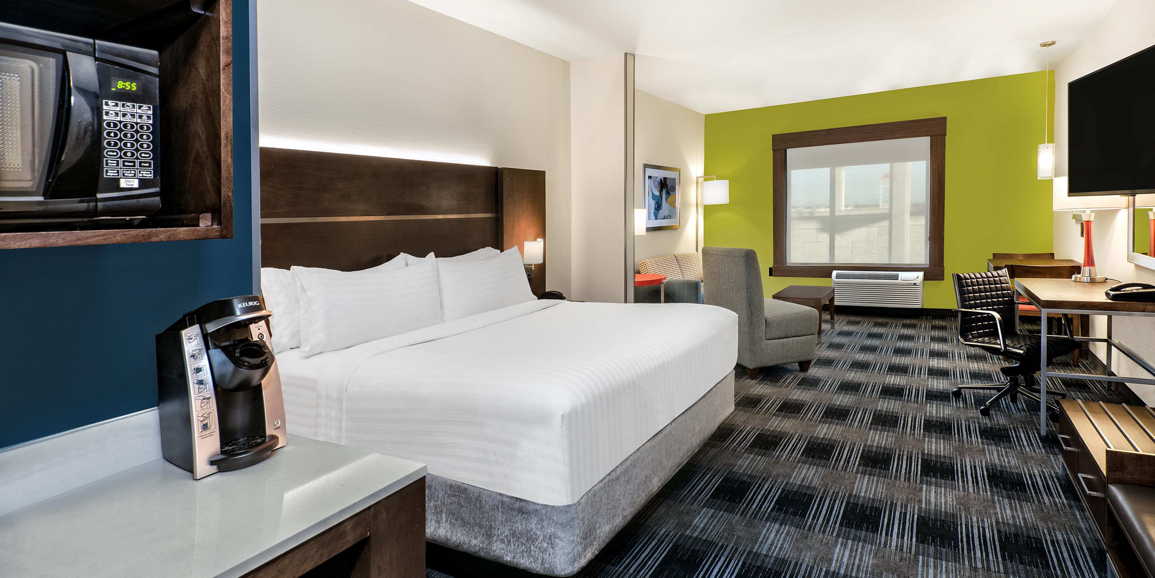 Our spacious suites are ideal for families or an extended stay. Each suite features a separate setting area with a pull-out sofa, full workstation so that you can stay productive on the road, Keurig coffee maker, microwave, mini-fridge, and HDTV. All of our guest rooms have complimentary Wi-Fi and our full hot breakfast buffet each morning.