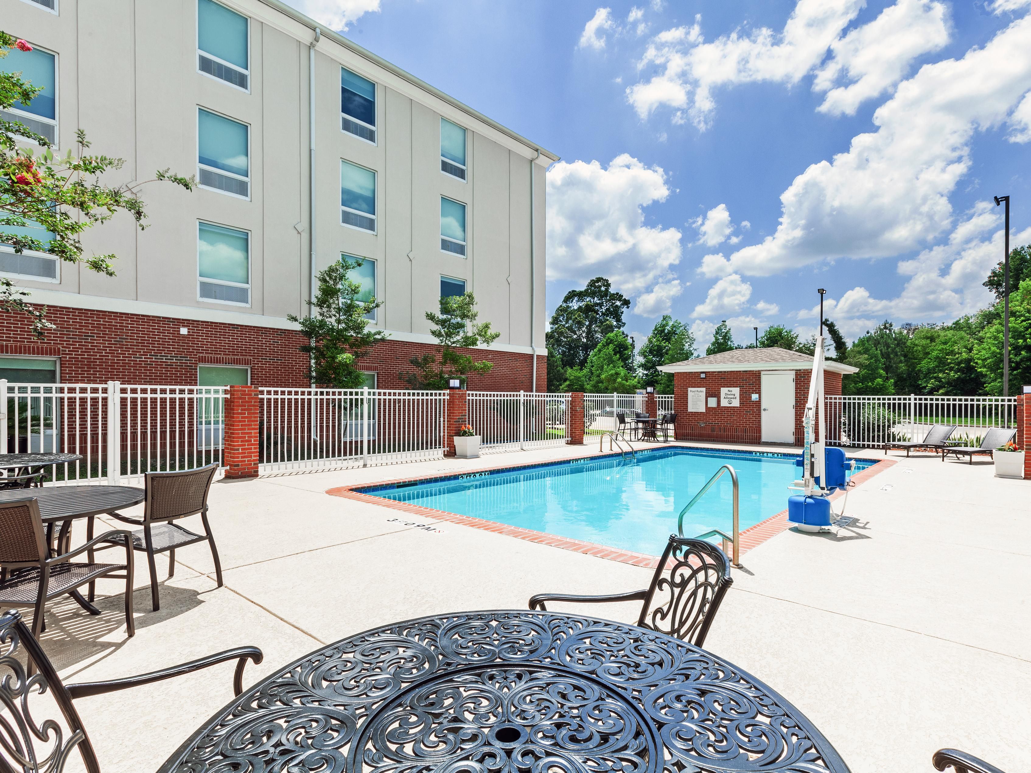 Take a plunge to escape from the heat in our outdoor pool!