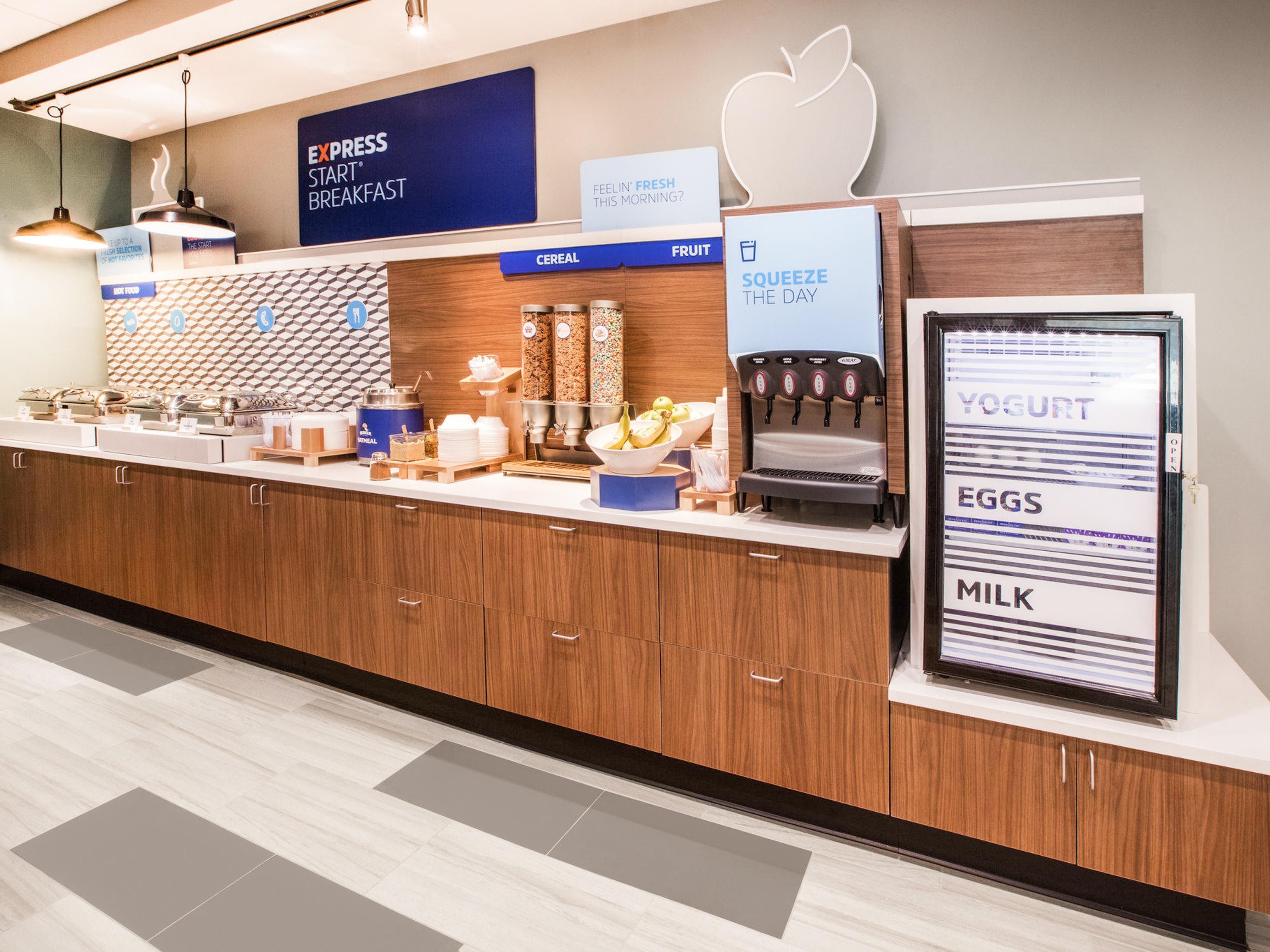 Fuel your day with our complimentary Express Start breakfast buffet, featuring a variety of hot and cold options. Enjoy classic eggs and bacon or sausage, and lighter fare like yogurt and cereal. Complement your meal with freshly brewed coffee. Breakfast is served daily from 6:00am to 9:00am.