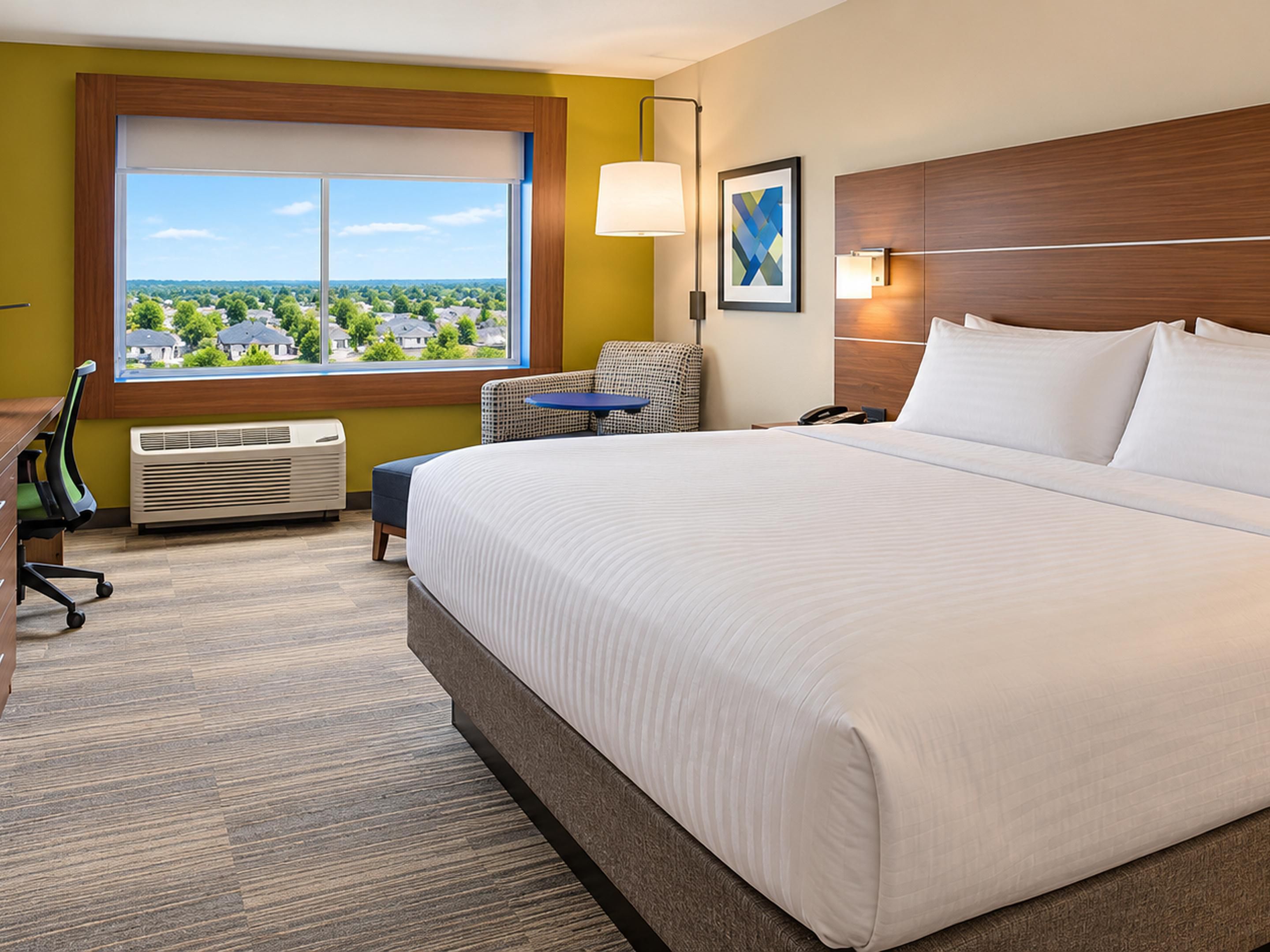 Relax and recharge in a comfortable king room designed for rest.