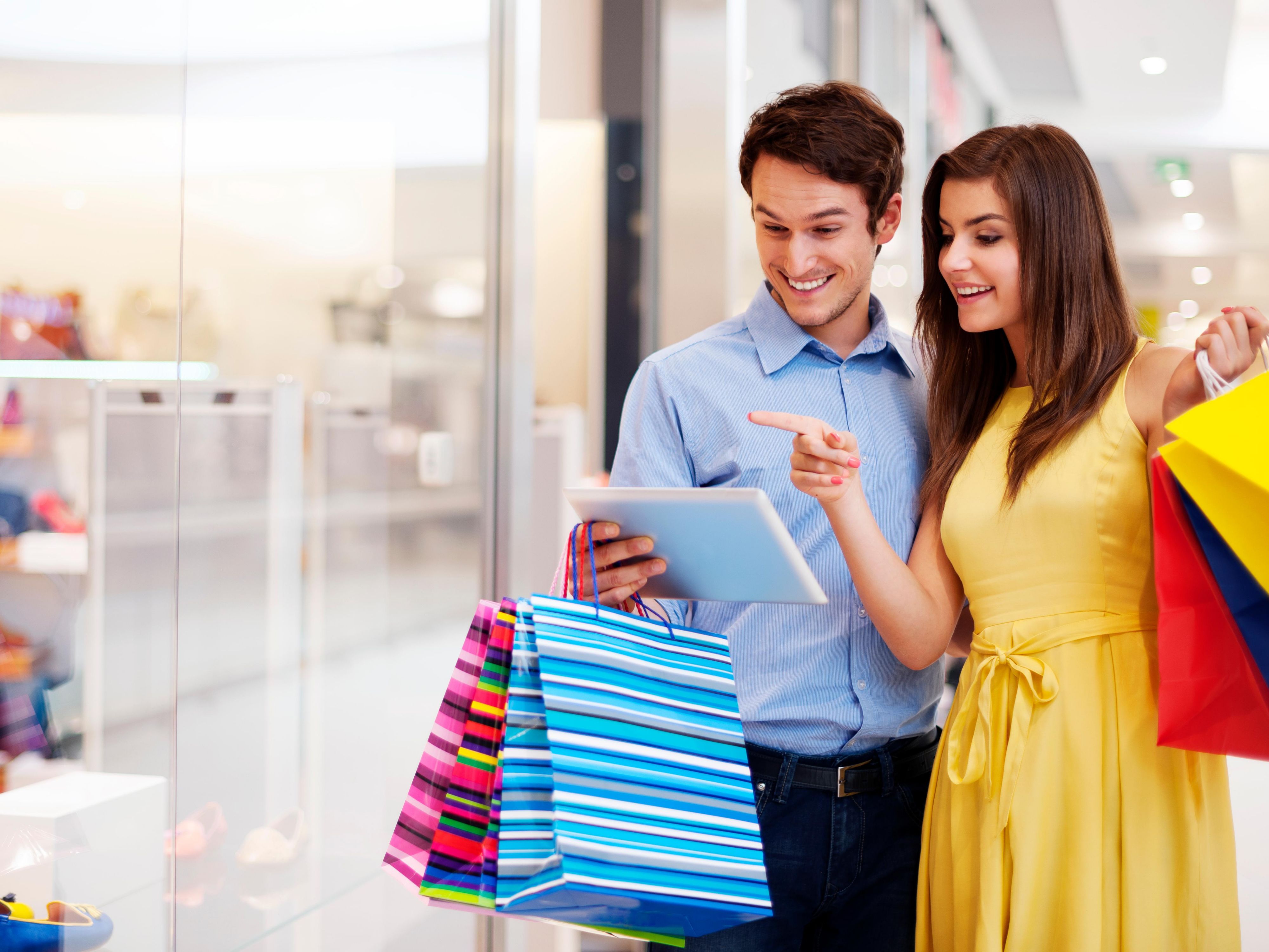 Large outdoor mall with shops, restaurants, and a movie theater (Estero).