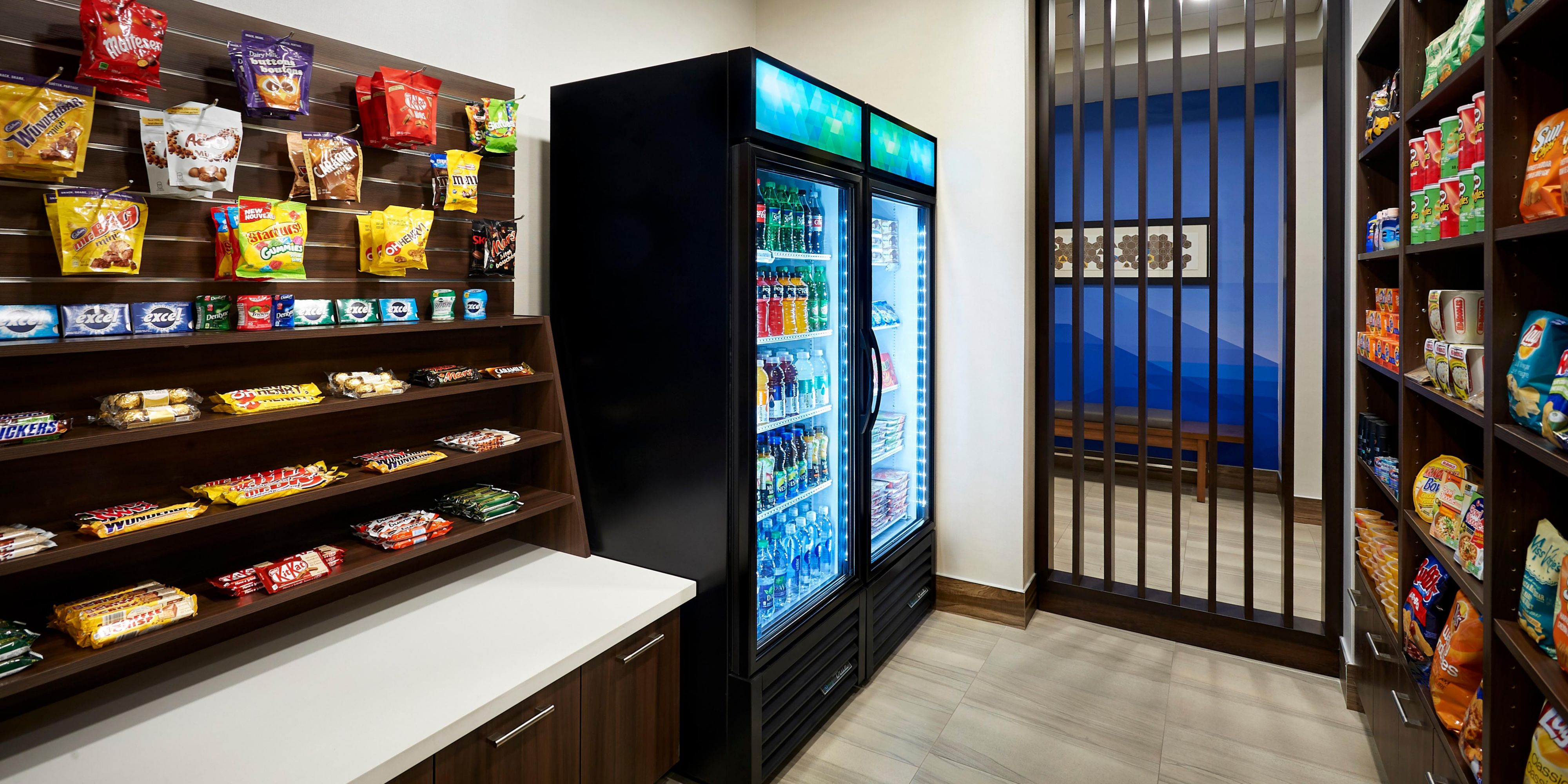 Visit our suite shop located next to the front desk in the lobby of the hotel. We may have the salty or sweet snack you are looking for. Find an array of chocolate, chips, candy, drinks, ice cream & more! Any questions? Please contact us.