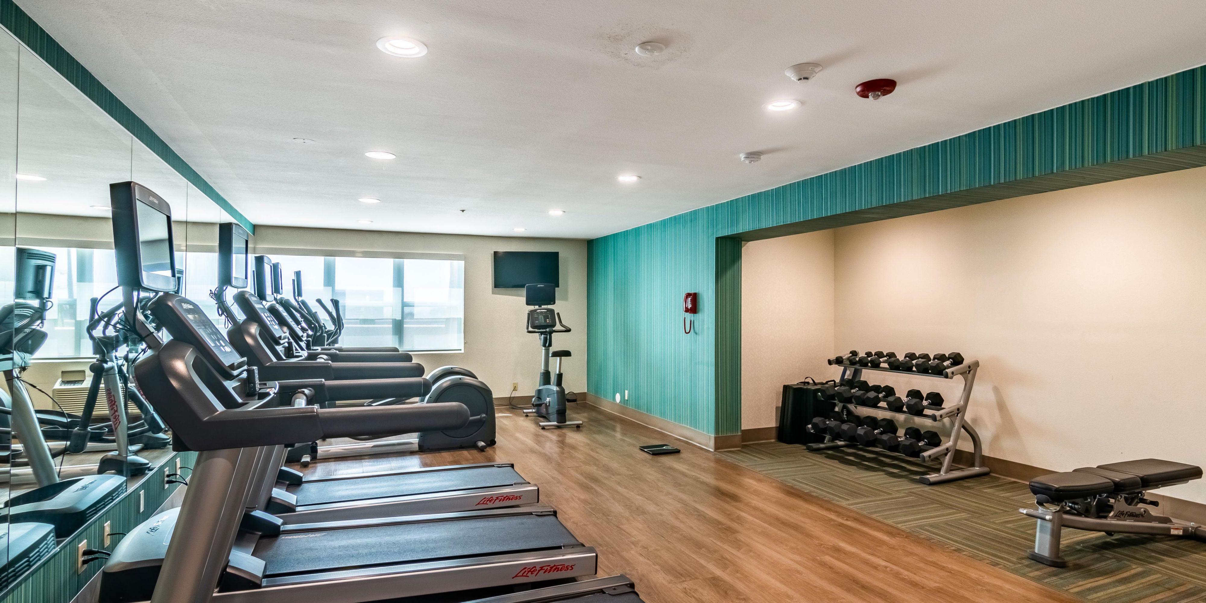 Our complimentary Fitness Center offers the flexibility to stay fit and healthy while traveling. State of the art equipment for cardio and weight work outs. Water and hand towels available.