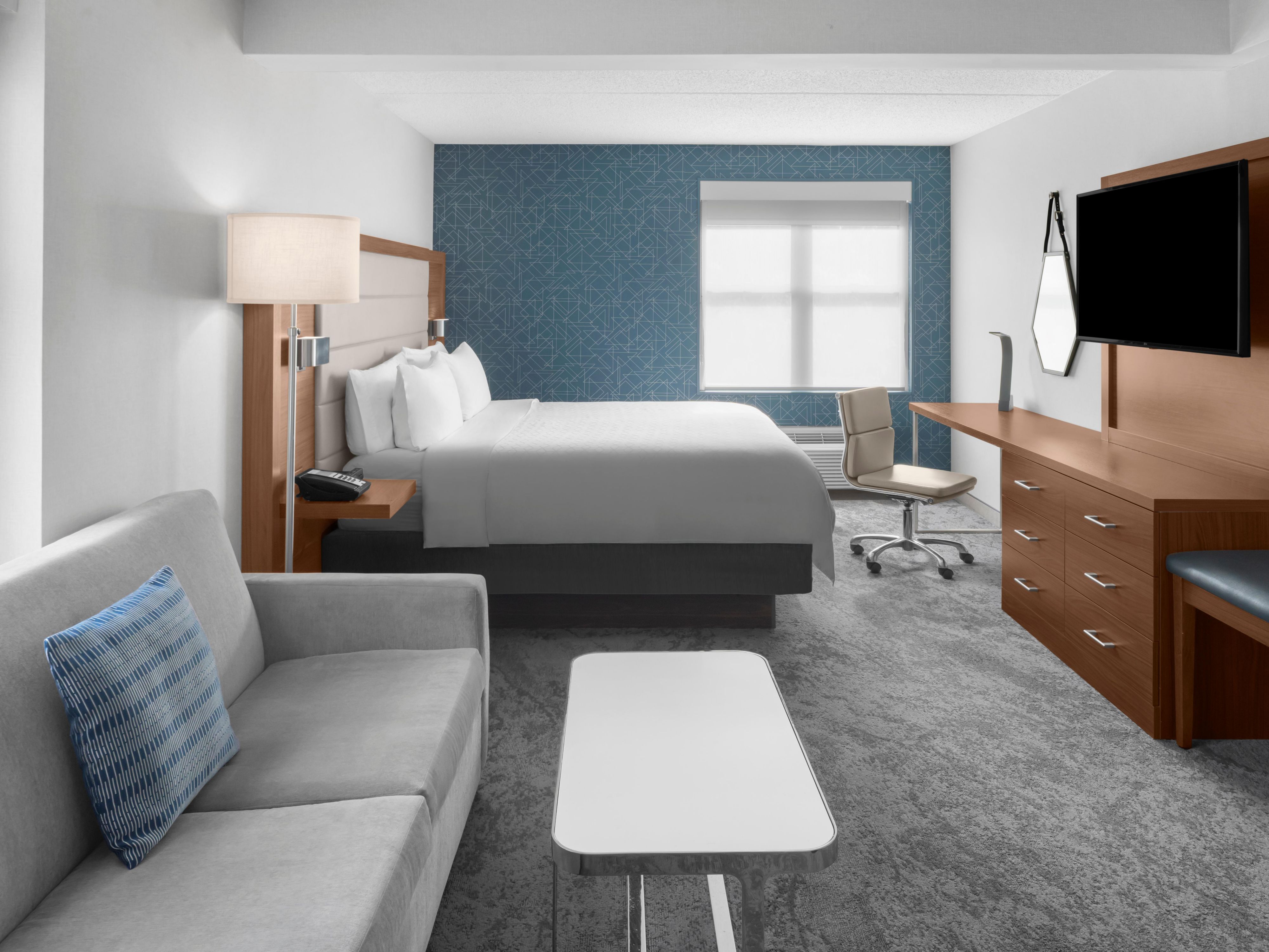 A spacious relaxing suite with pull-put sofa awaits 