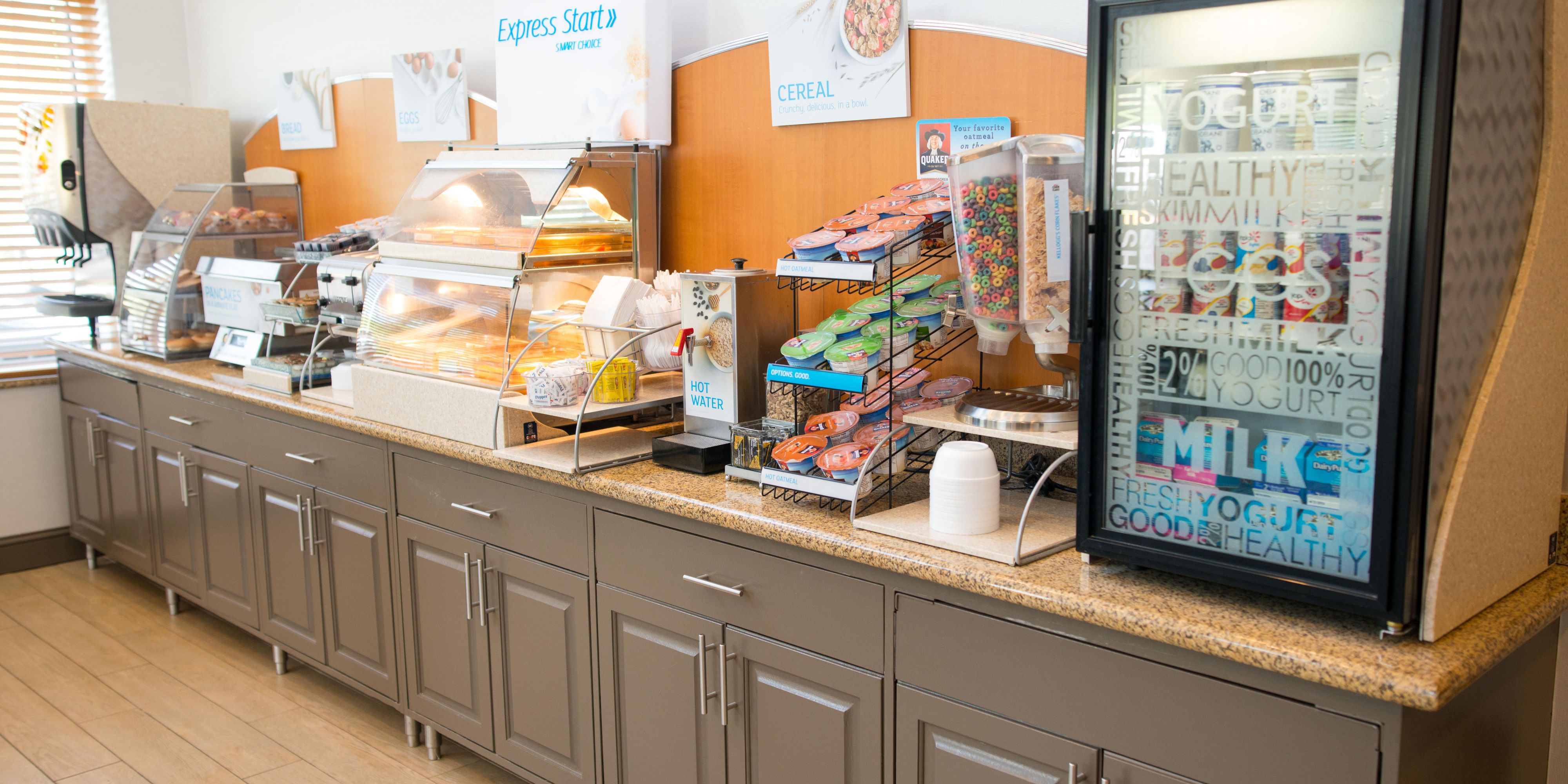 Our complimentary Express Start Breakfast bar offers a wide variety of hot & cold options including a rotation of egg & meat selections, biscuits or muffins, fruit, our famous cinnamon rolls & Smart Roast coffee.  Did we mention our one-touch pancake machine or our freshly cooked oatmeal kettle? You have to see it for yourself!  