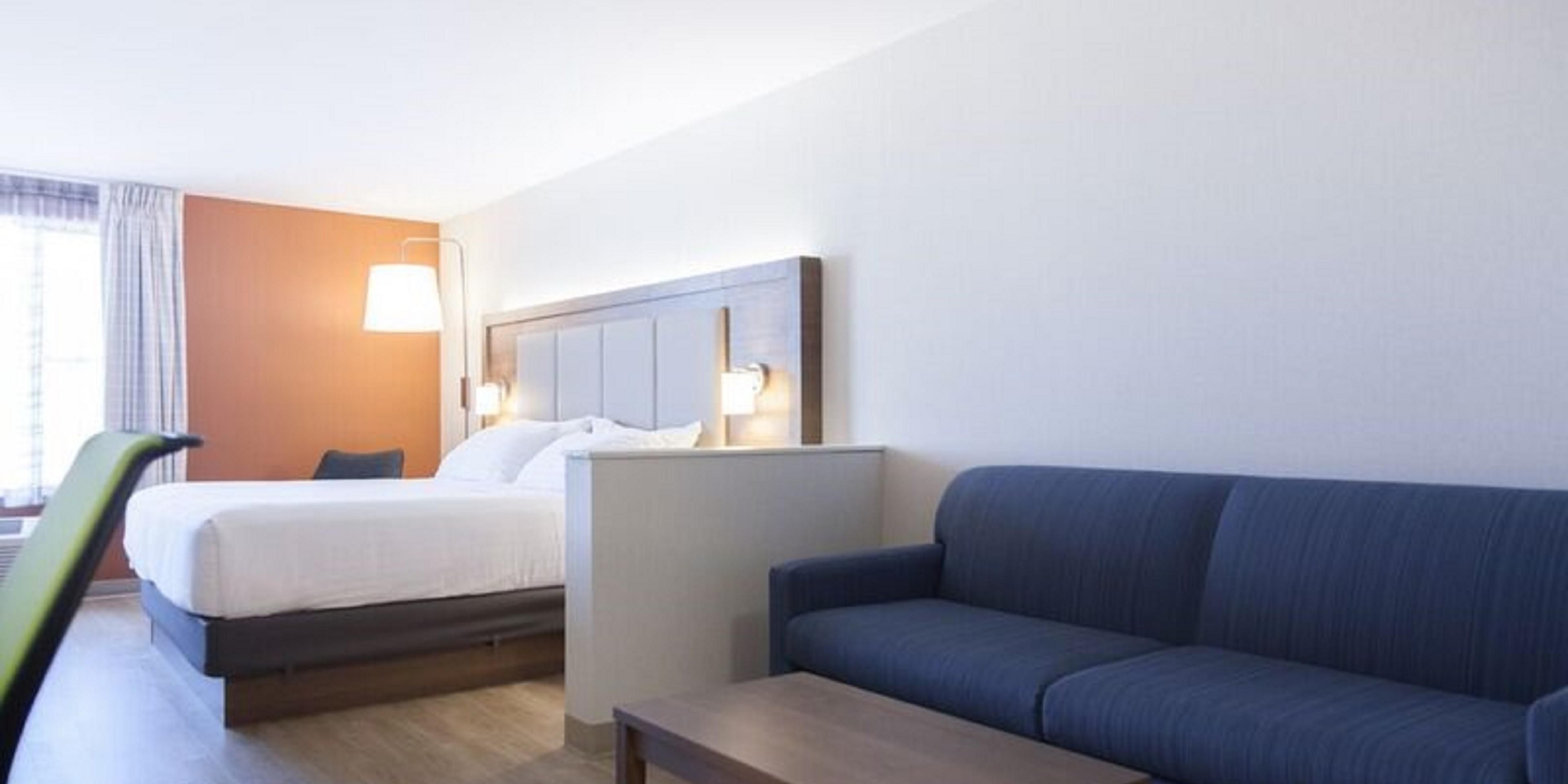 Check out our King Suites - designed with comfort and efficiency in mind these contemporary rooms include a King bed, mini-fridge, microwave, full workstation with complimentary ultra high speed WiFi and two flat screen HDTV's