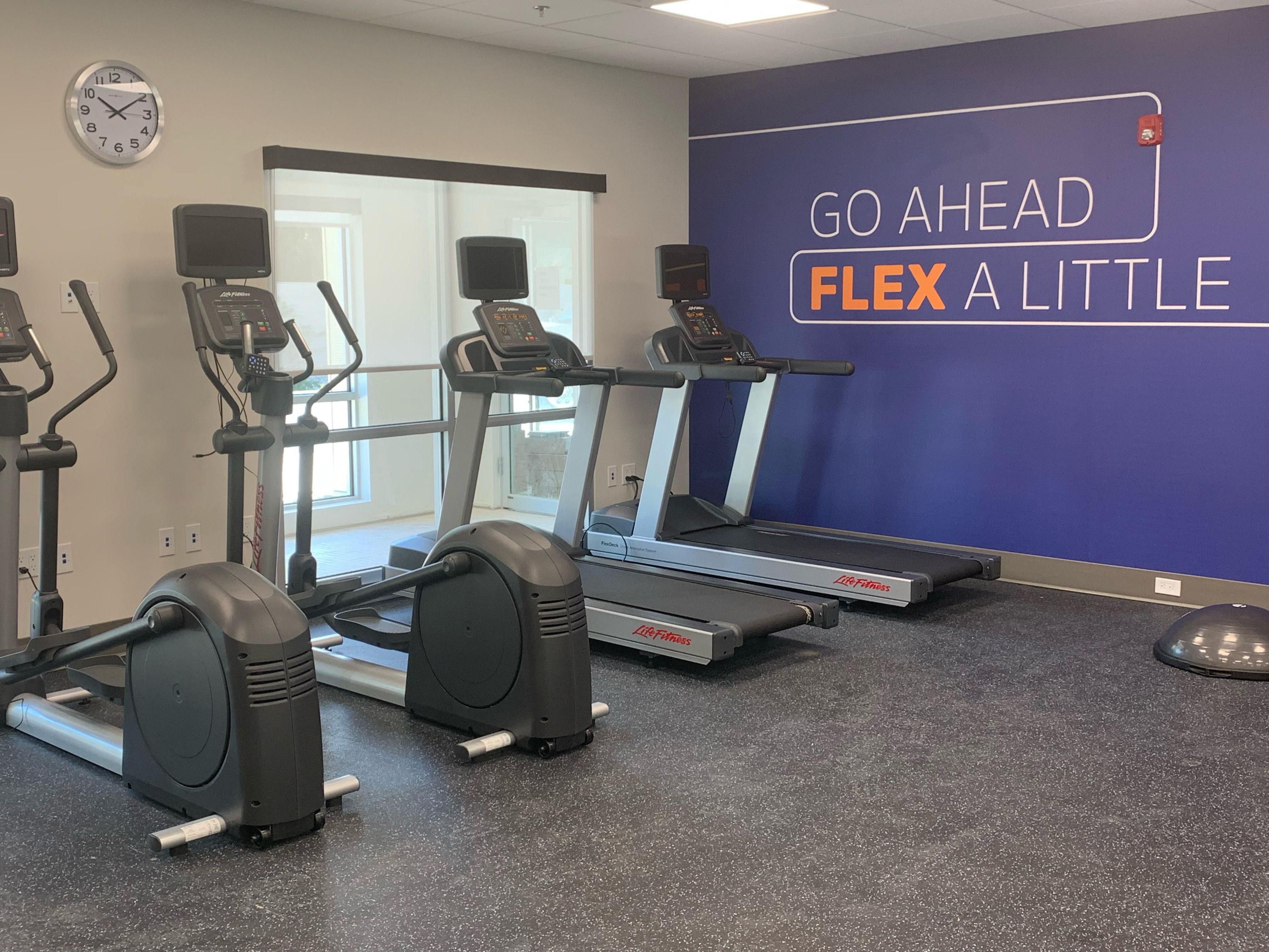 Spacious fitness center fully equipped to get you moving