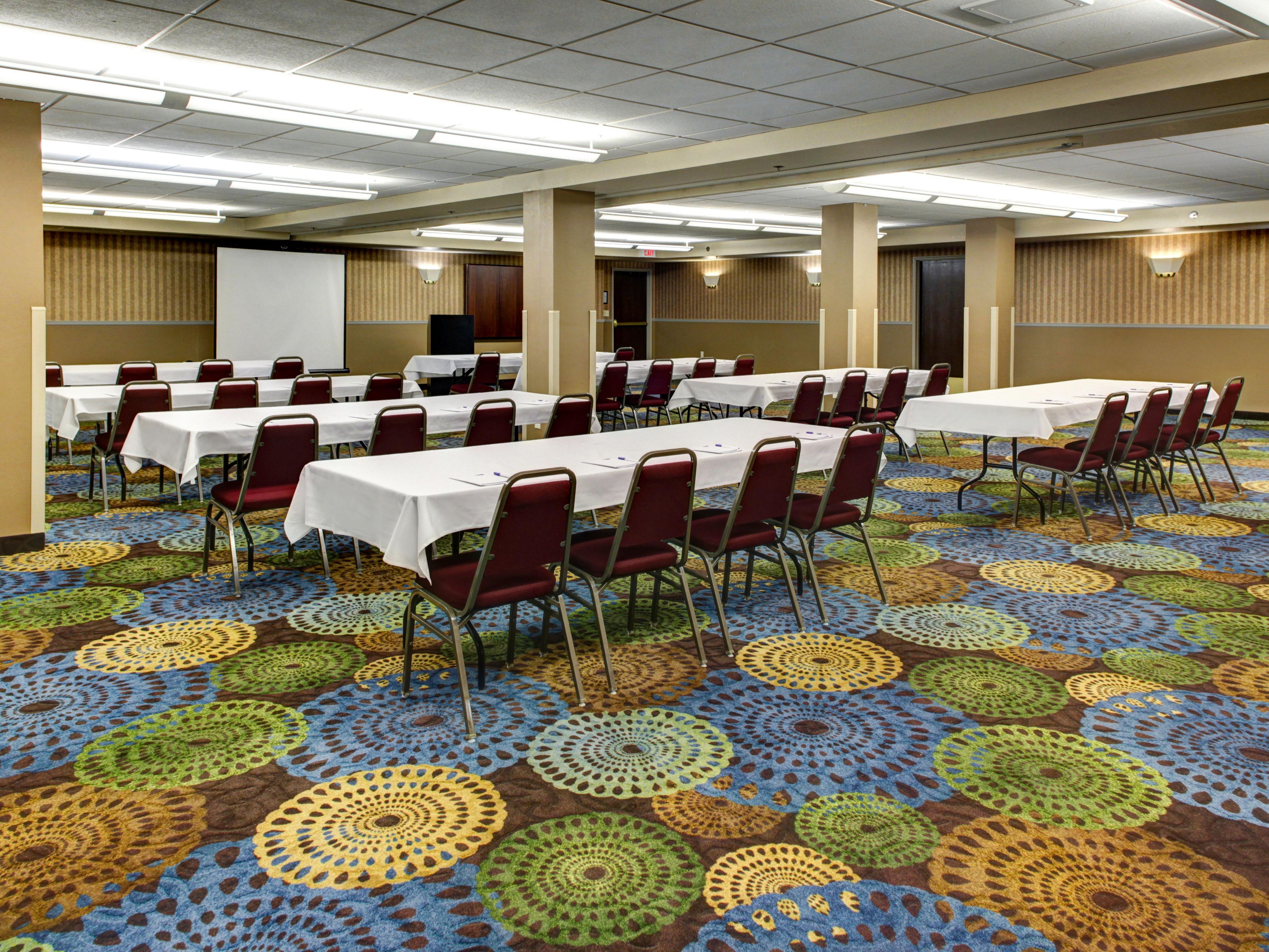 Plan your next event and meeting at the Holiday Inn Express and Suites. Our event space will comfortably accommodate 150 people. In addition, we are able to set the space to your party's needs. For instance, displayed, is a classroom set-up. However, our hotel has the ability to set the space to entertain and host banquets & presentations as well.