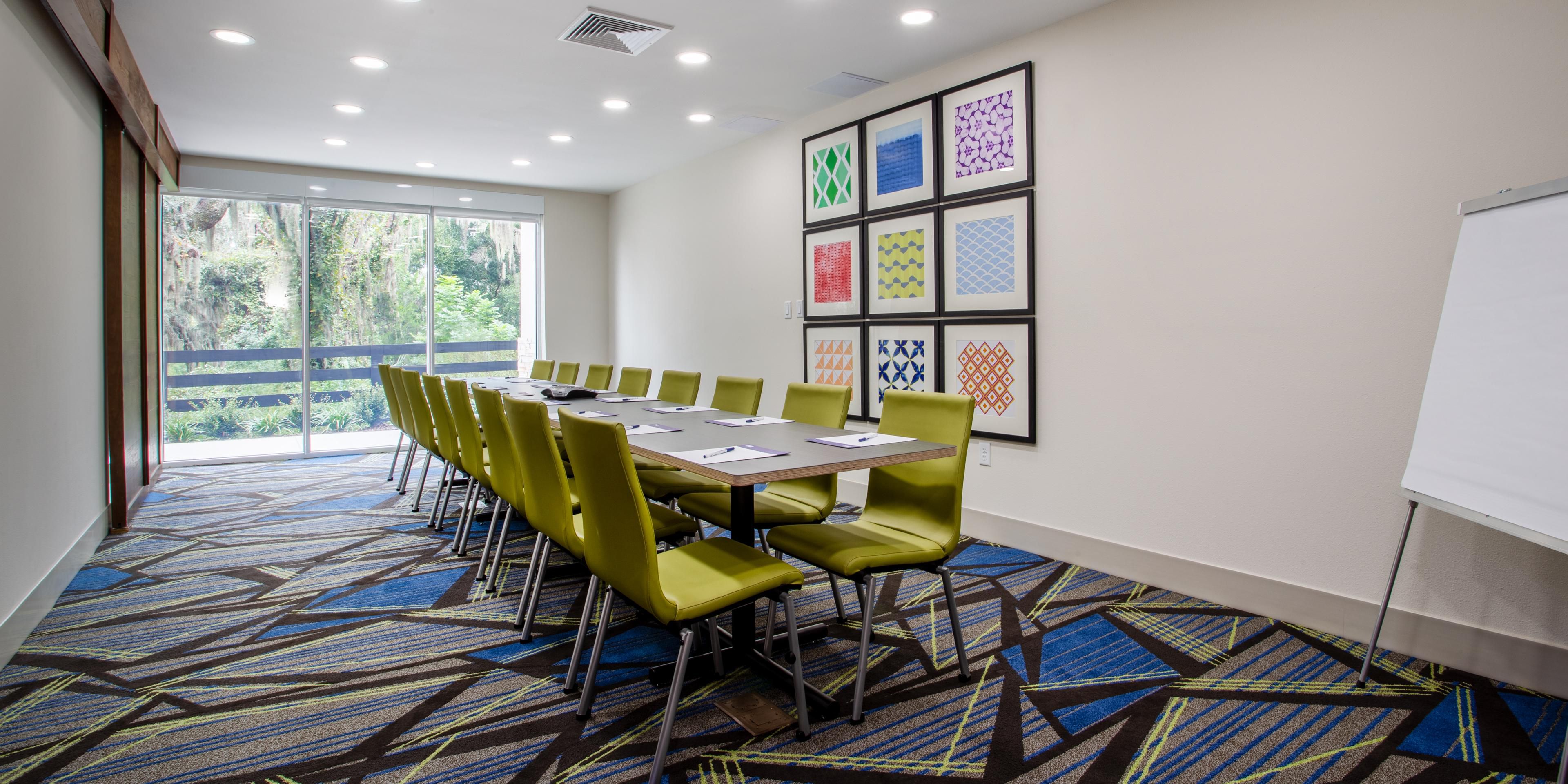 Our meeting space is the perfect spot for small meetings and events. The room is equipped with an extra-large flat-panel TV with connections for your devices. It is next to the lobby/breakfast area, great for breakouts or meals. But oh the view... you cannot beat our floor-to-ceiling window view of natural Florida!