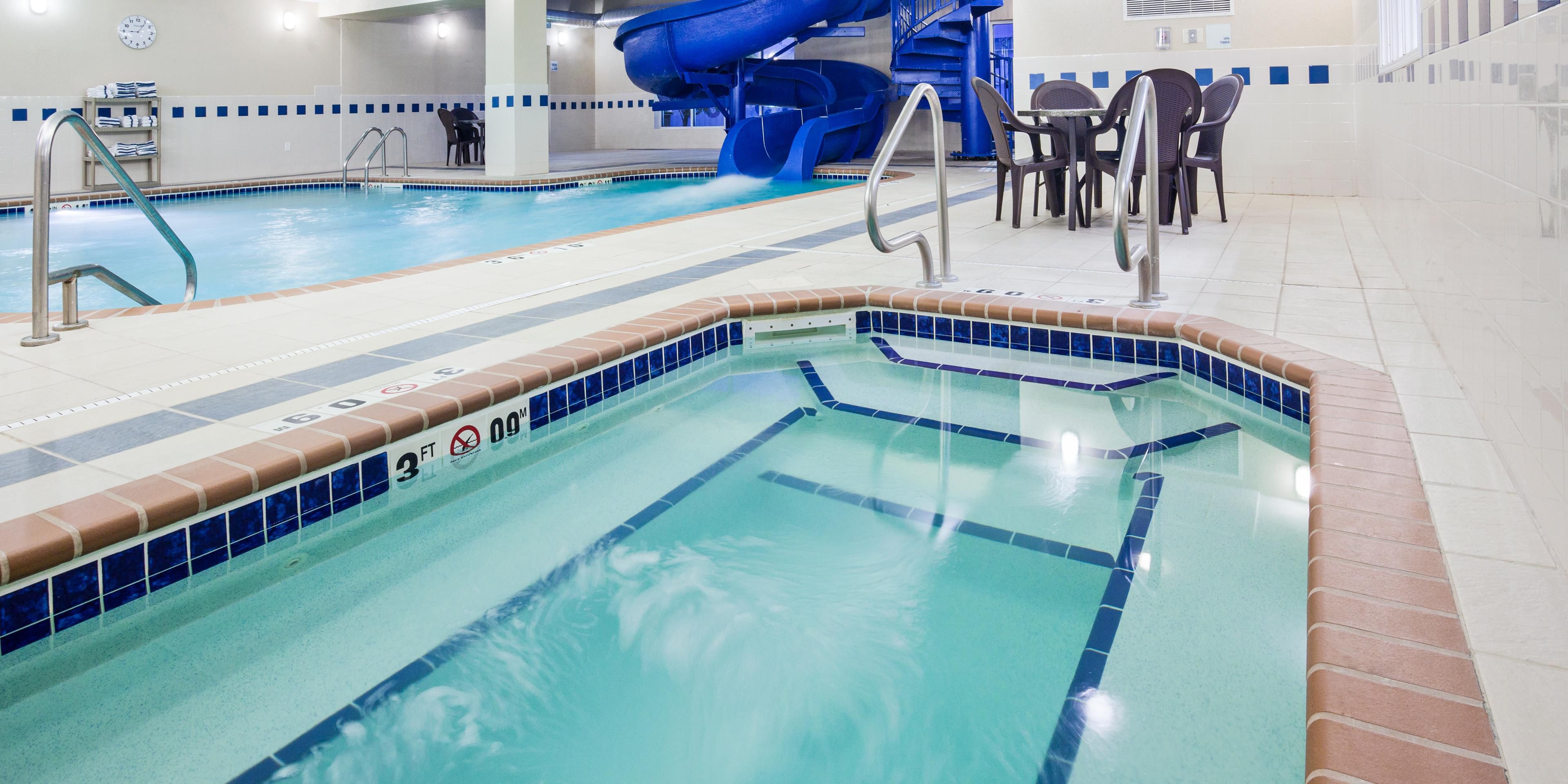 Our hotel comes equipped with an impressive water recreation area, providing fun for all ages. Our indoor pool features a 110 ft water slide, and a relaxing hot tub. For our guests' convenience, the hotel pool and water slide are open year around. No matter the season enjoy the accessibility of our refreshing pool area. 
