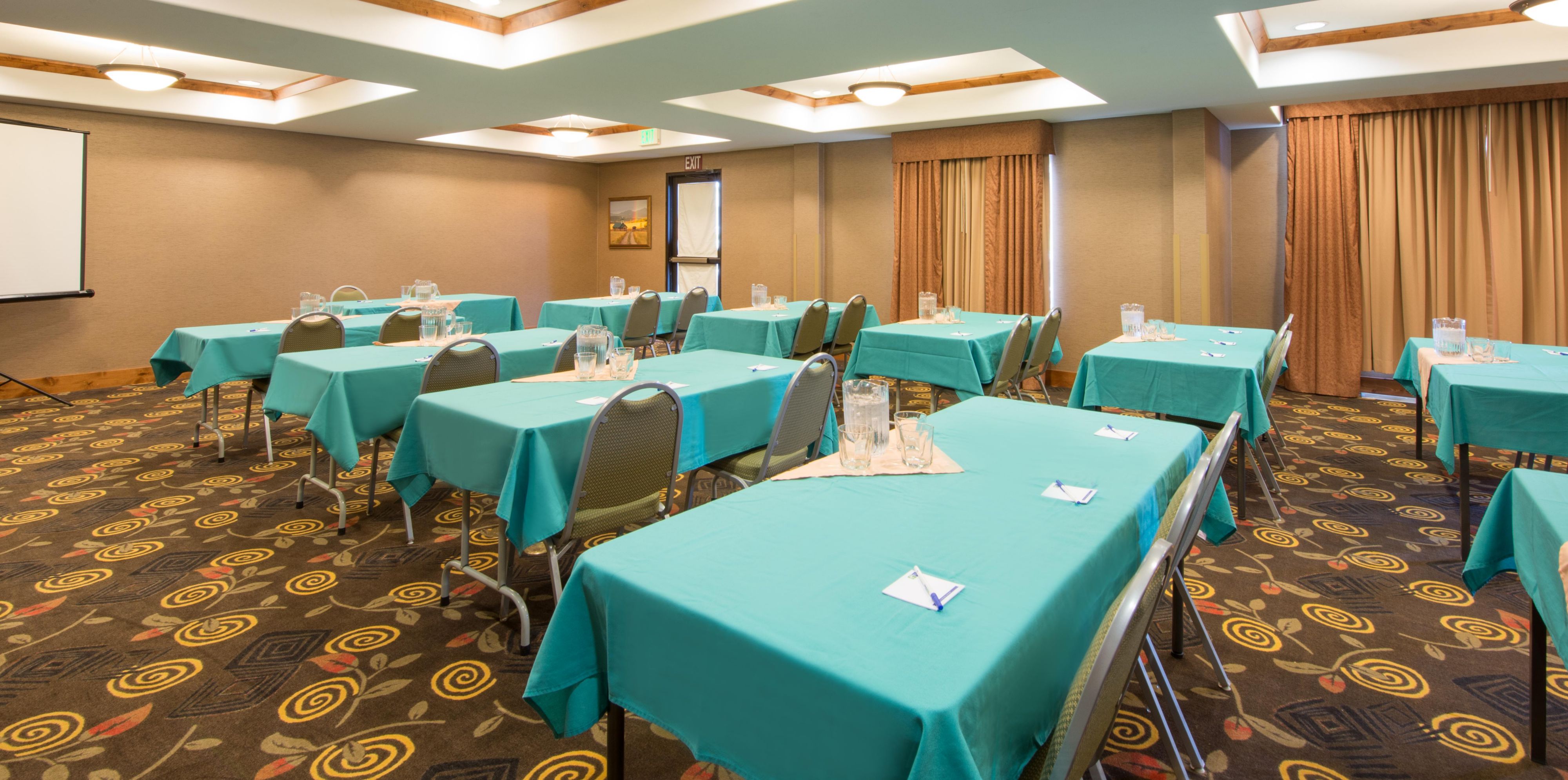 We have two great rooms to provide meeting spaces.  One is a larger room, can equip up to 45 people and other space is a smaller board room, with a large table and fits 10 chairs around. 