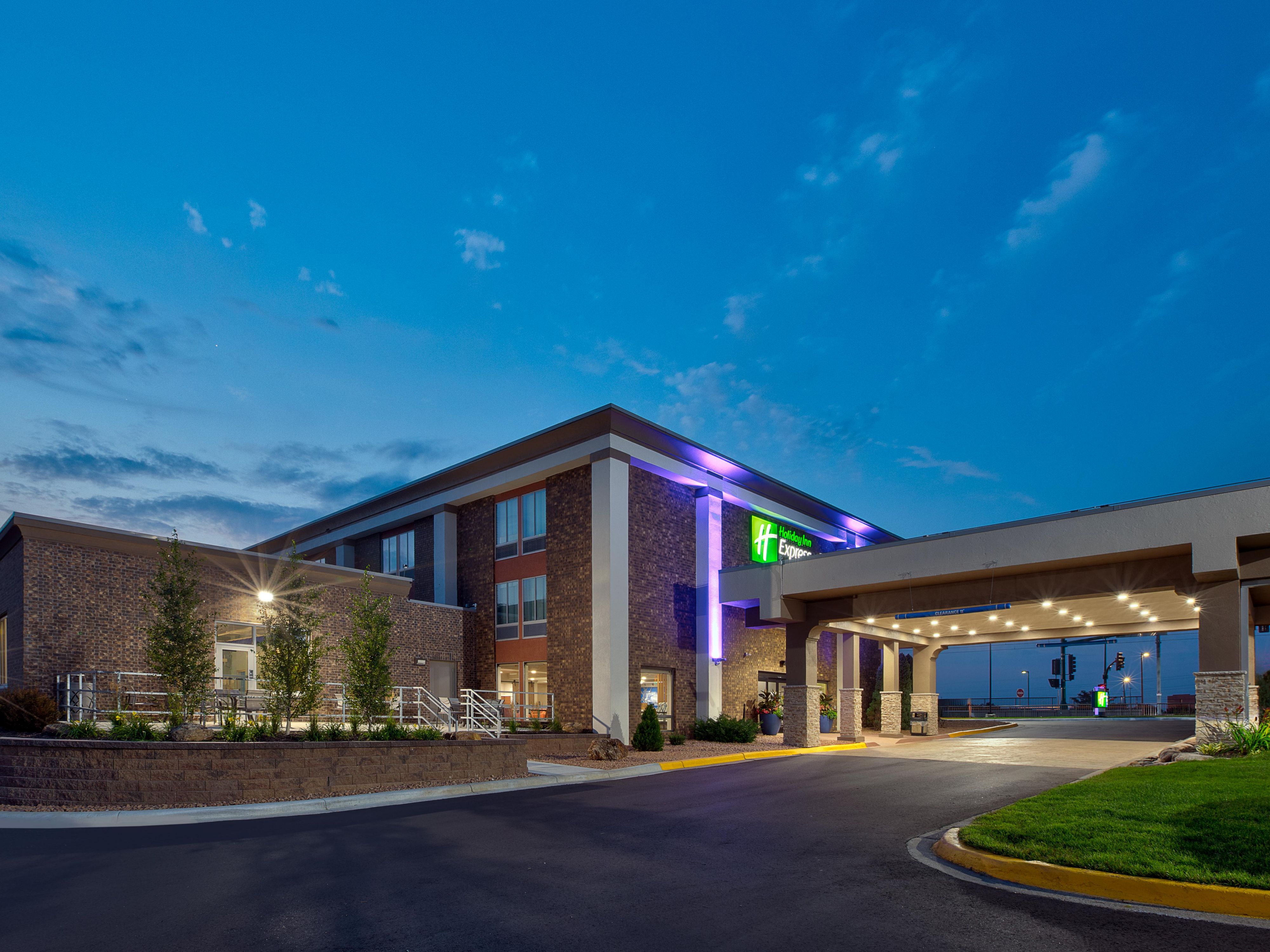 Modern Holiday Inn Express Eden Prairie exterior at dusk